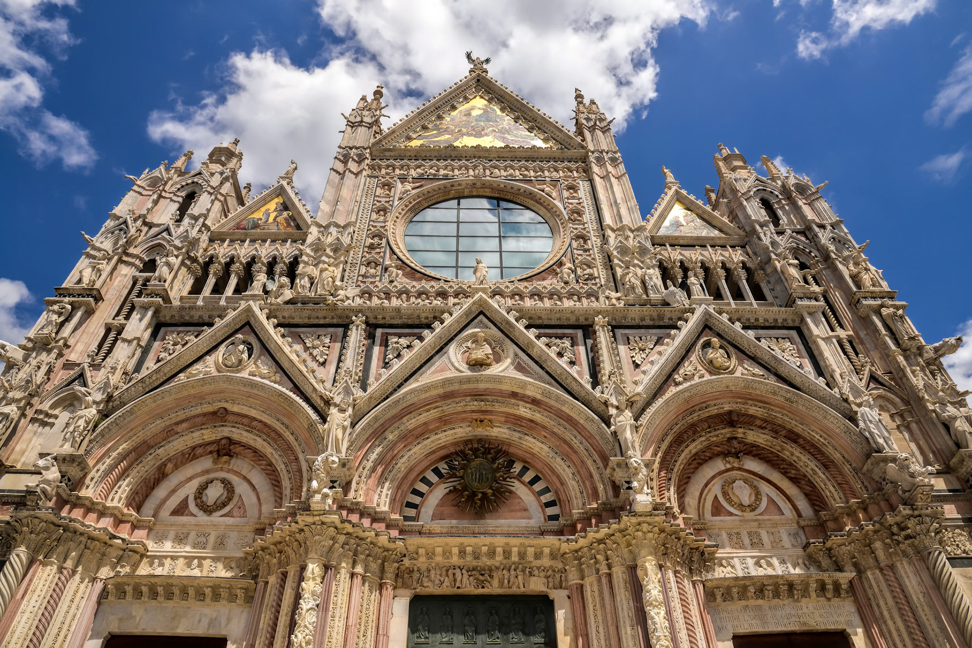 SIENA, TUSCANY, ITALY - MAY 18 : Facade of the Cathedral in Siena, Tuscany, Italy on May 18, 2013
