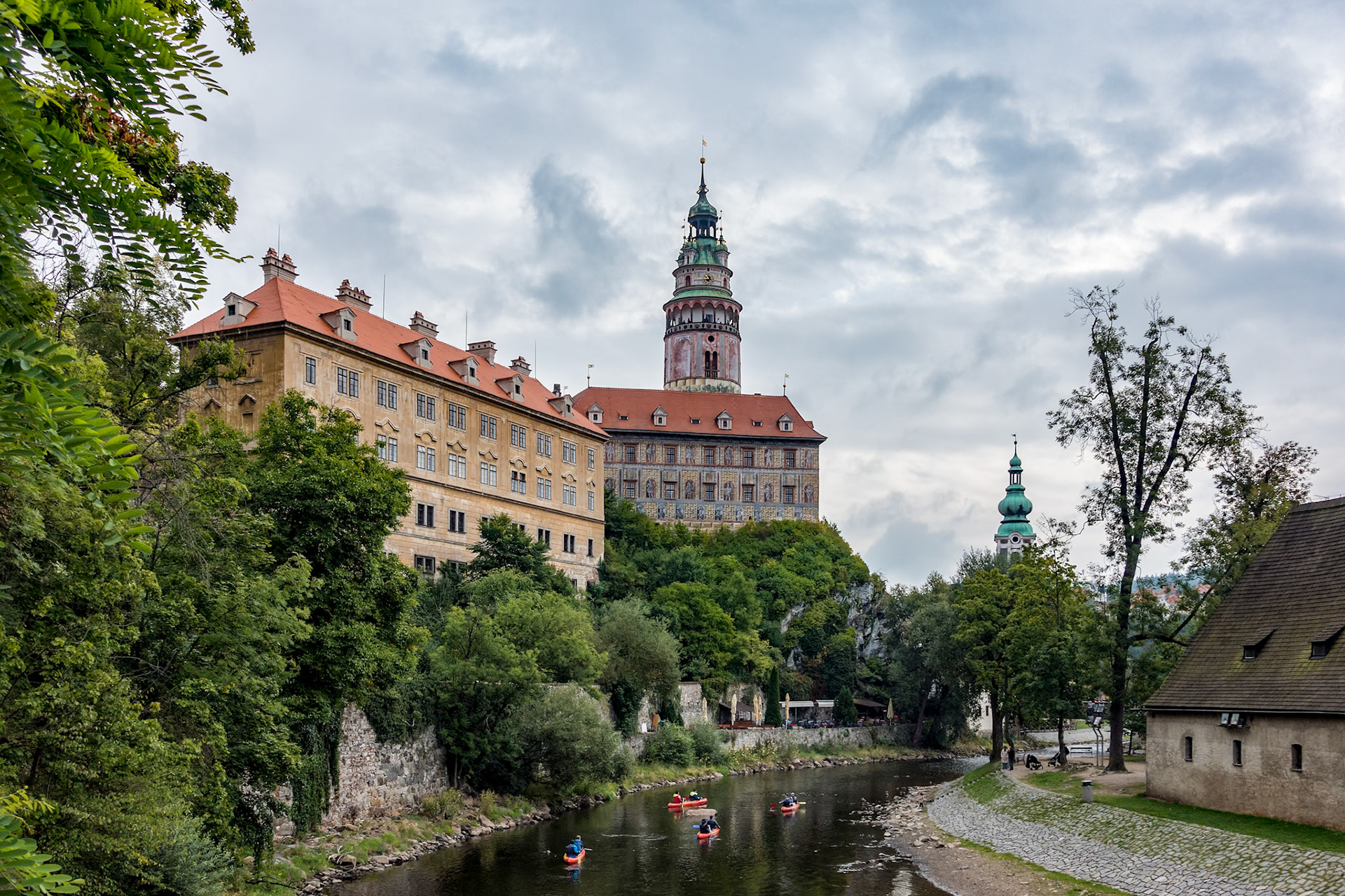 People Canoeing down the Vlatava River to Krumlov
