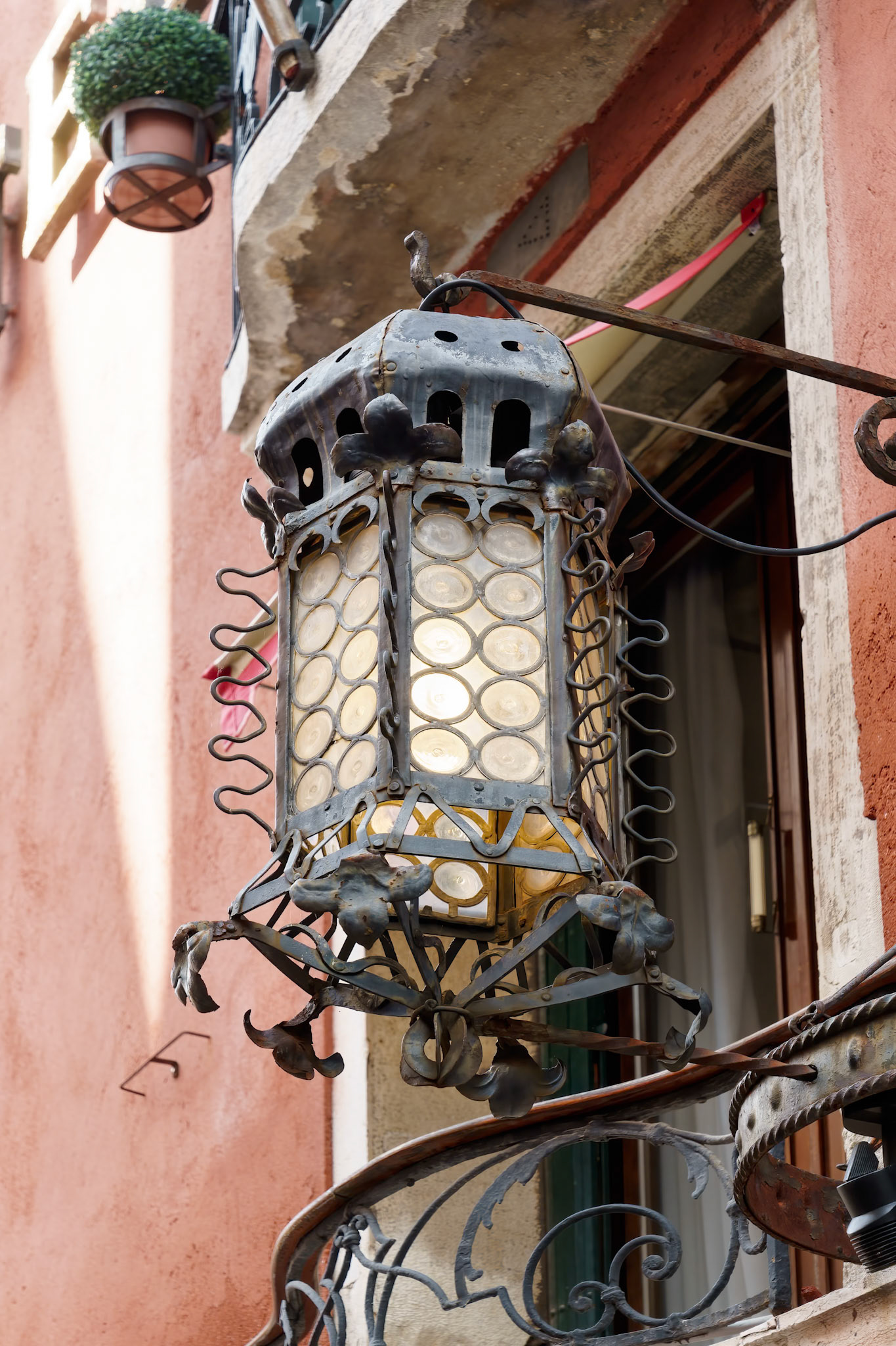 VENICE, ITALY - OCTOBER 12 : Old lamp outside Hotel Saturnia International in Venice on October 12, 2014