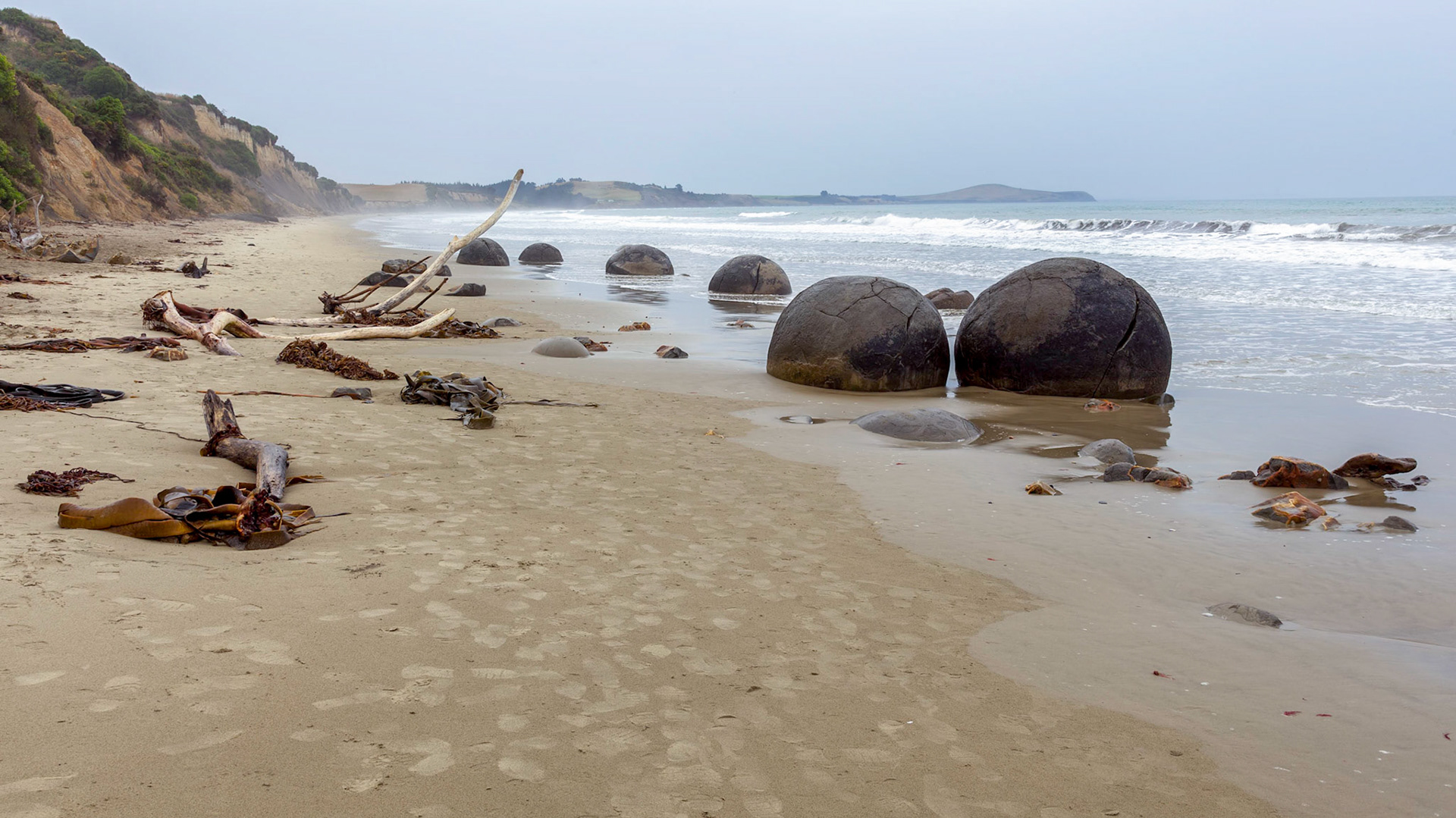 Moeraki Boulders at Koekohe Beach on the wave-cut Otago coast of New Zealand