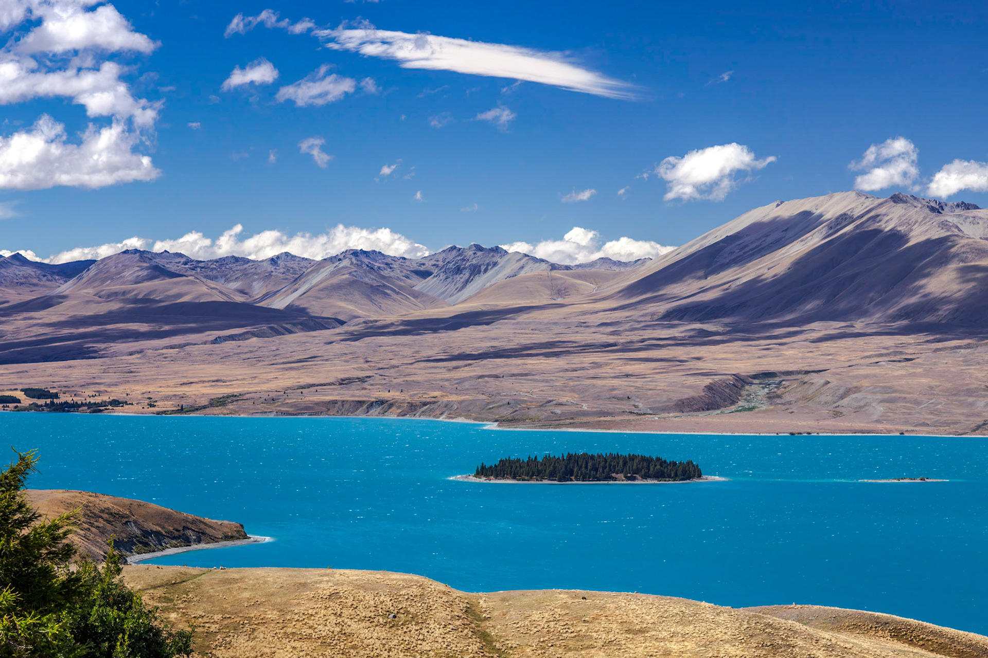Scenic view of Motuariki Island in the colourful Lake Tekapo