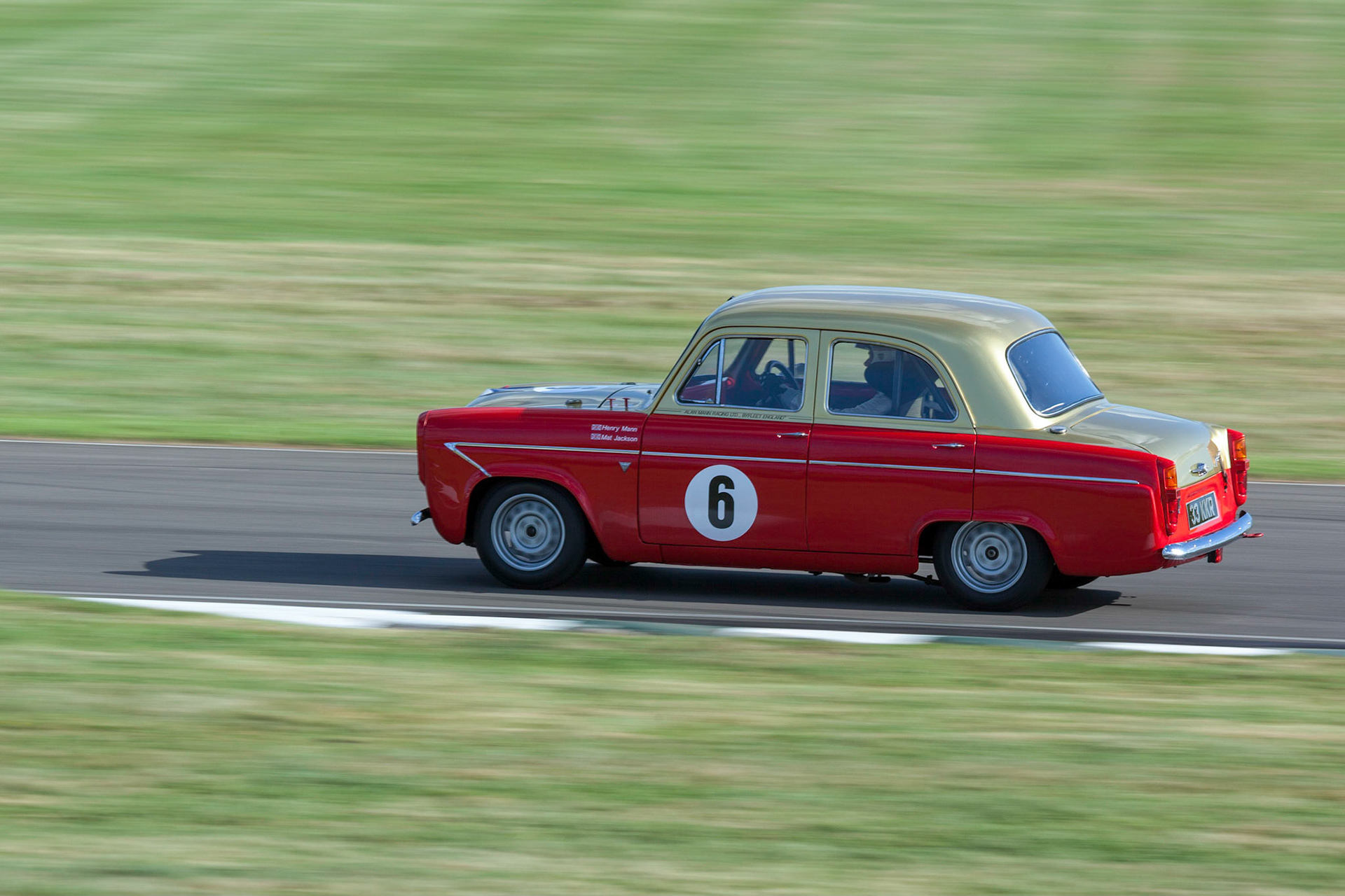 GOODWOOD, WEST SUSSEX/UK - SEPTEMBER 14 : Vintage Racing at Goodwood on September 14, 2012. One unidentified person
