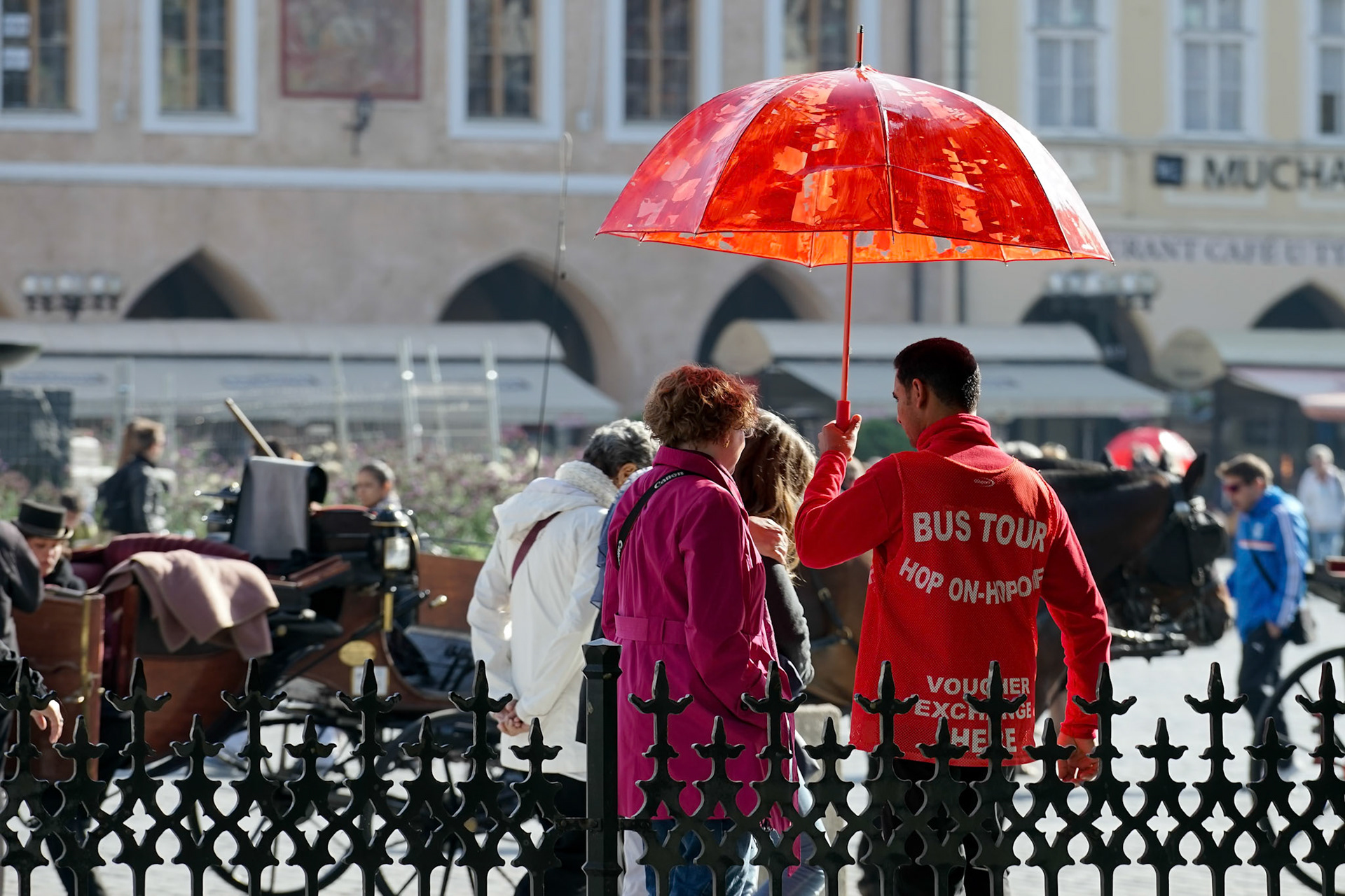 Bus Tour Guide in the Old Town Square in Prague