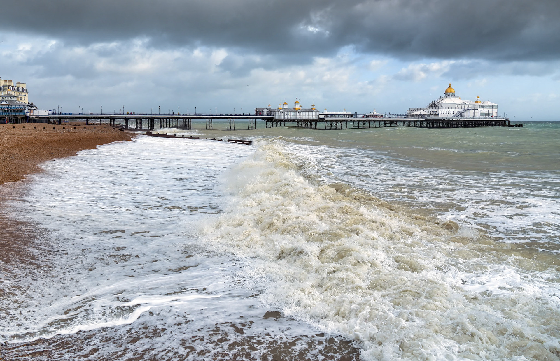 EASTBOURNE, EAST SUSSEX/UK - OCTOBER 21 : Tail End of Storm Brian Racing Past Eastbourne Pier in East Sussex on October 21, 2017
