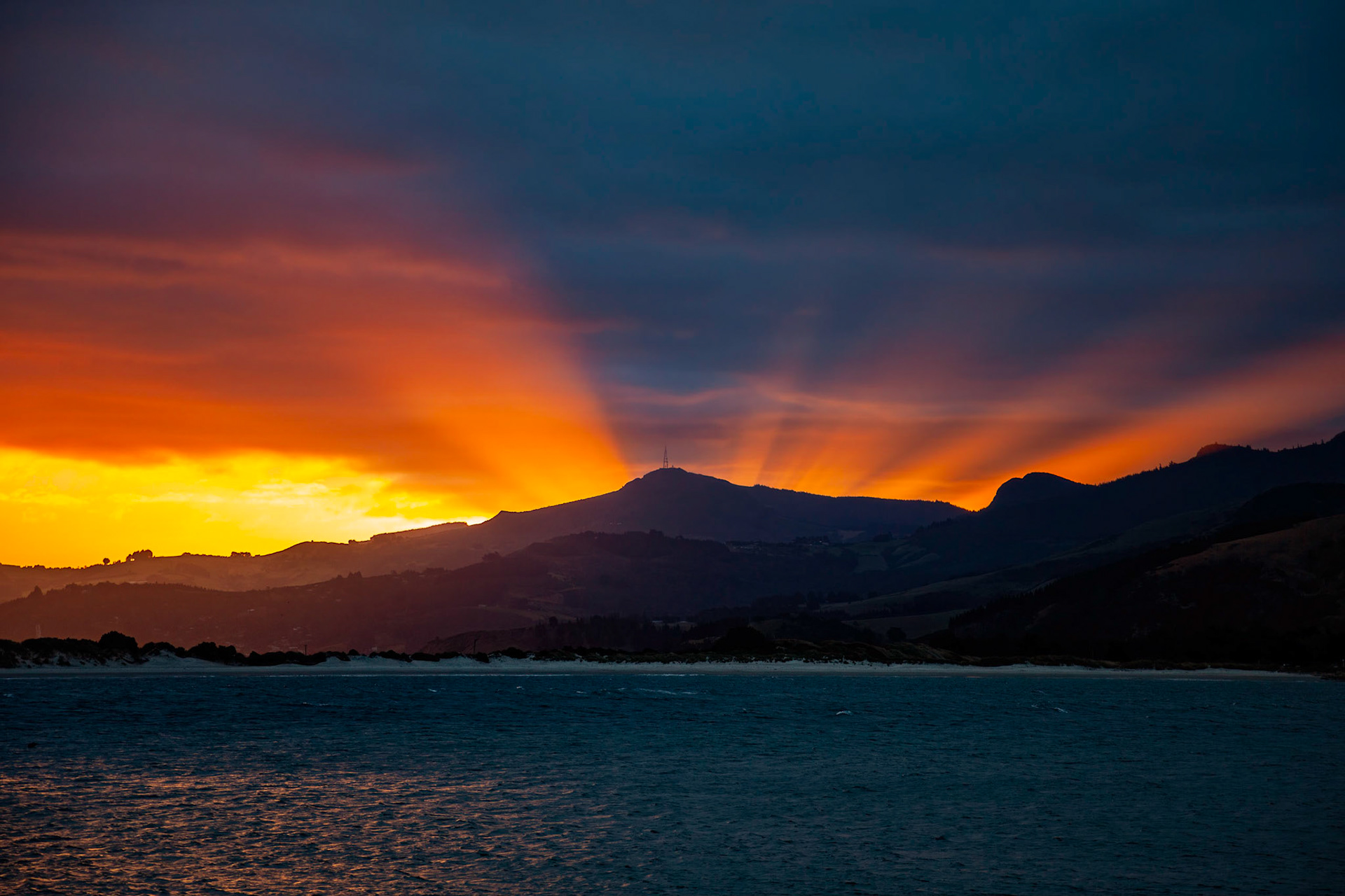 Sunset over Pilot Bay in New Zealand