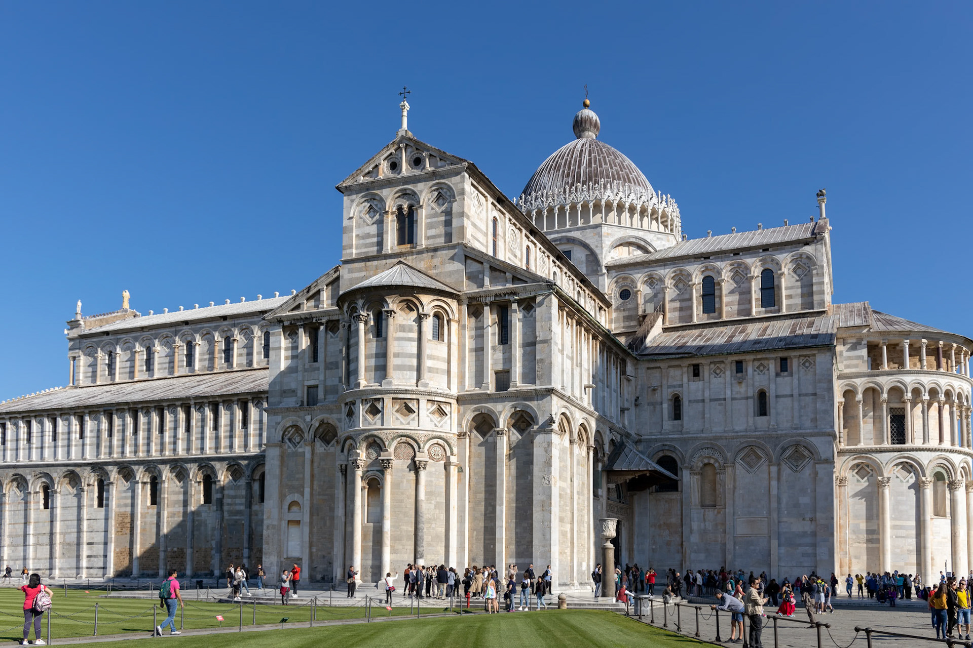 PISA, TUSCANY/ITALY  - APRIL 18 : Exterior view of the Cathedral in Pisa Tuscany Italy on April 18, 2019. unidentified people