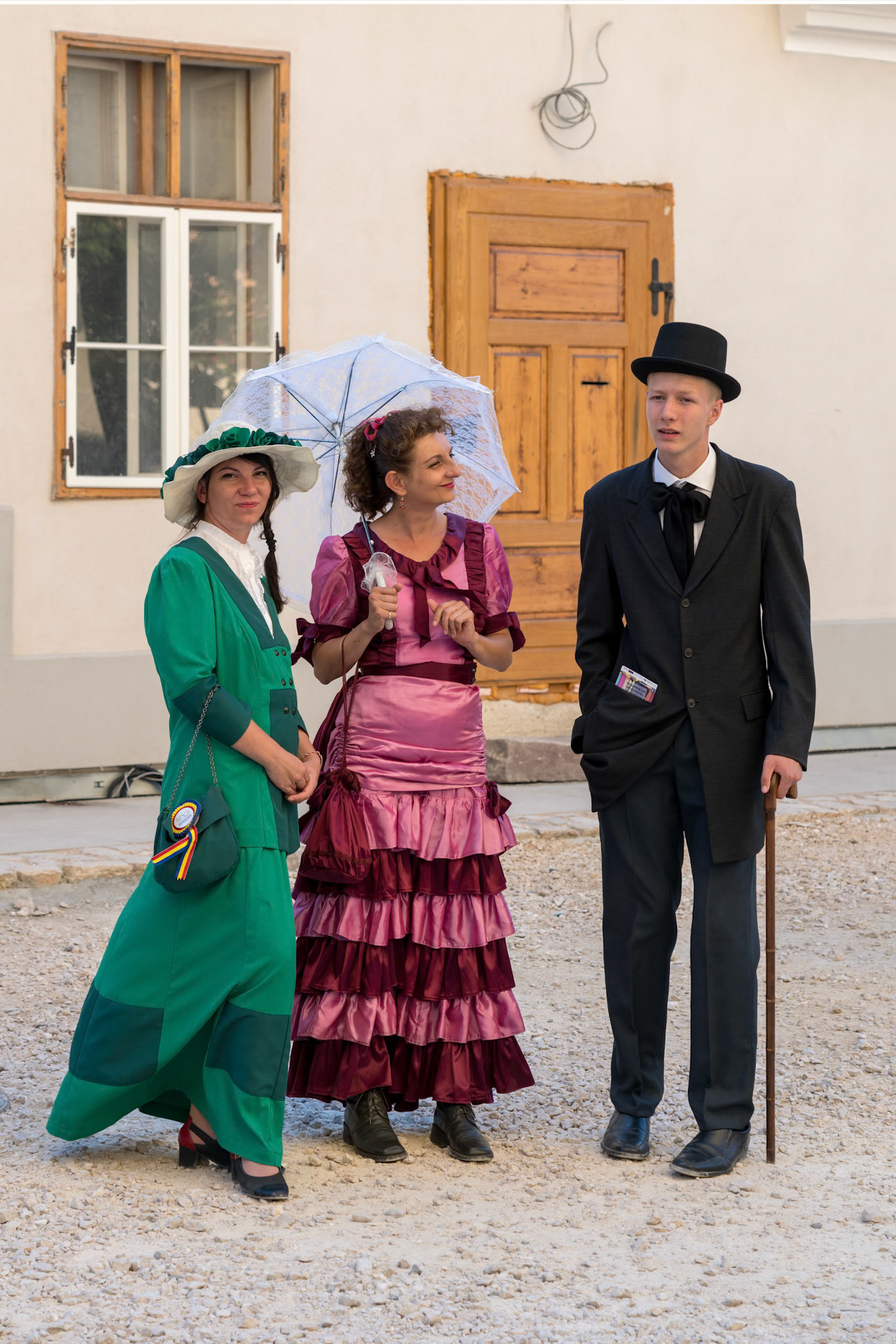 BRASOV, TRANSYLVANIA/ROMANIA - SEPTEMBER 20 : People posing in traditional costume in Brasov Transylvania Romania on September 20, 2018. Three unidentified people