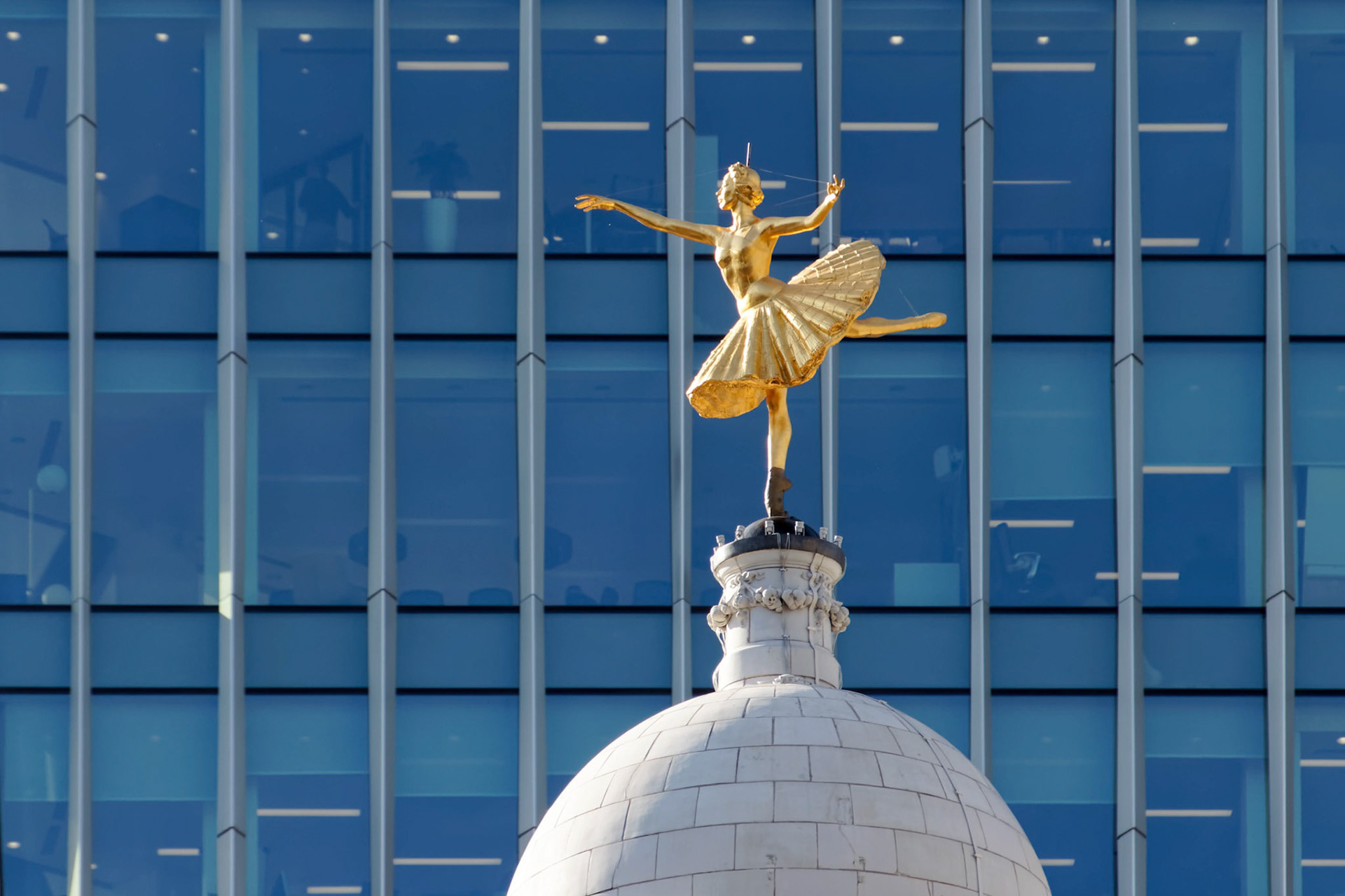 LONDON/UK - MARCH 21 : Replica Statue of Anna Pavlova on the Cupola of the Victoria Palace Theatre in London on March 21, 2018
