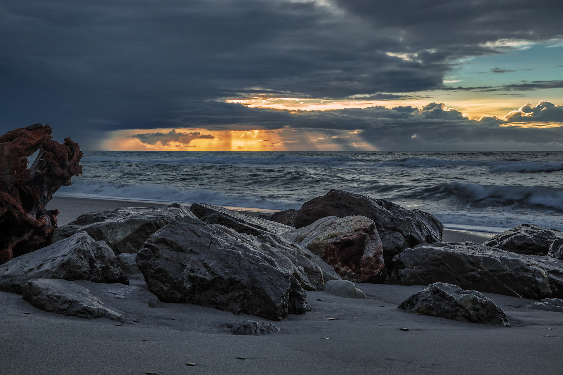 Sunset at Hokitika beach in New Zealand