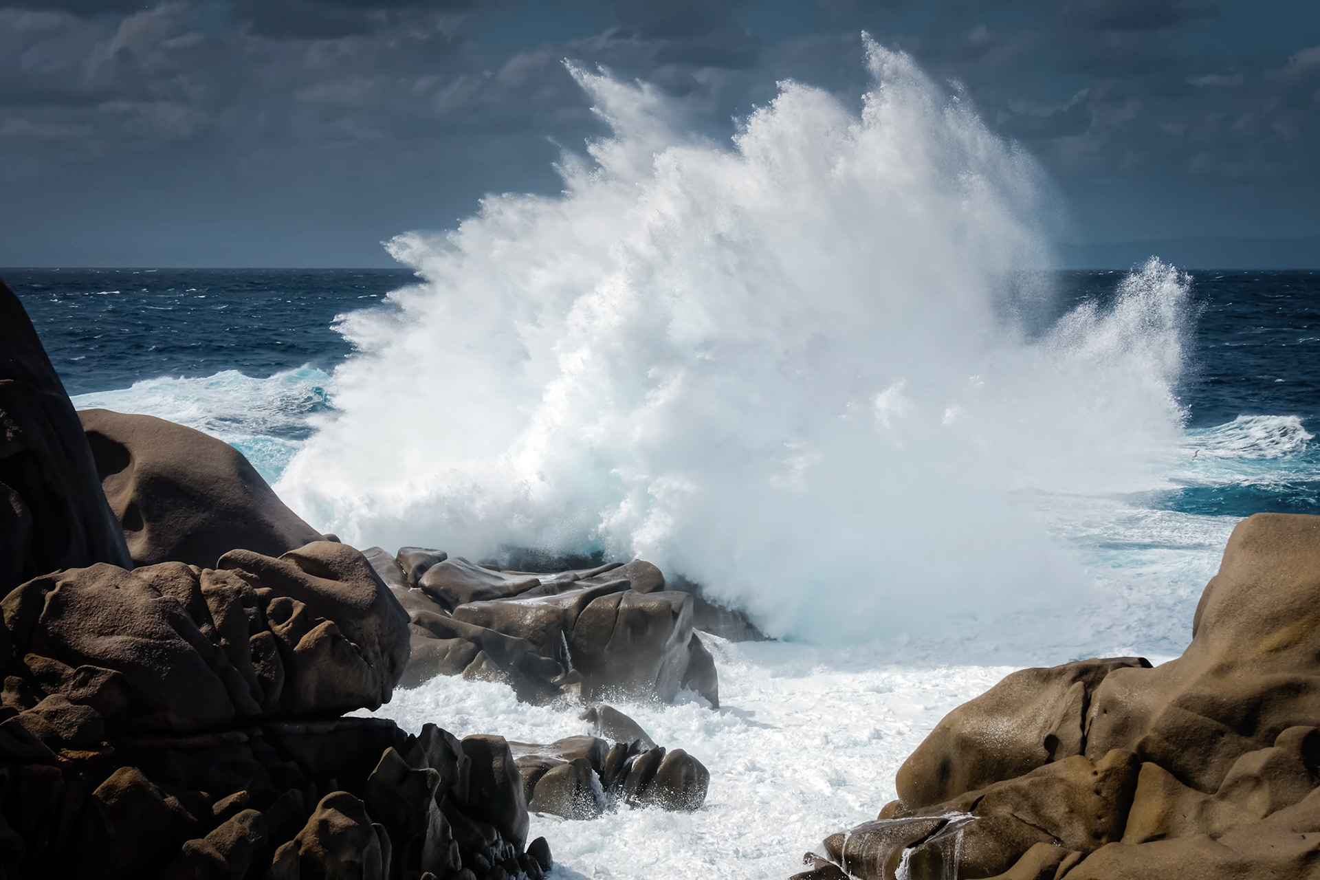 Waves Pounding the Coastline at Capo Testa