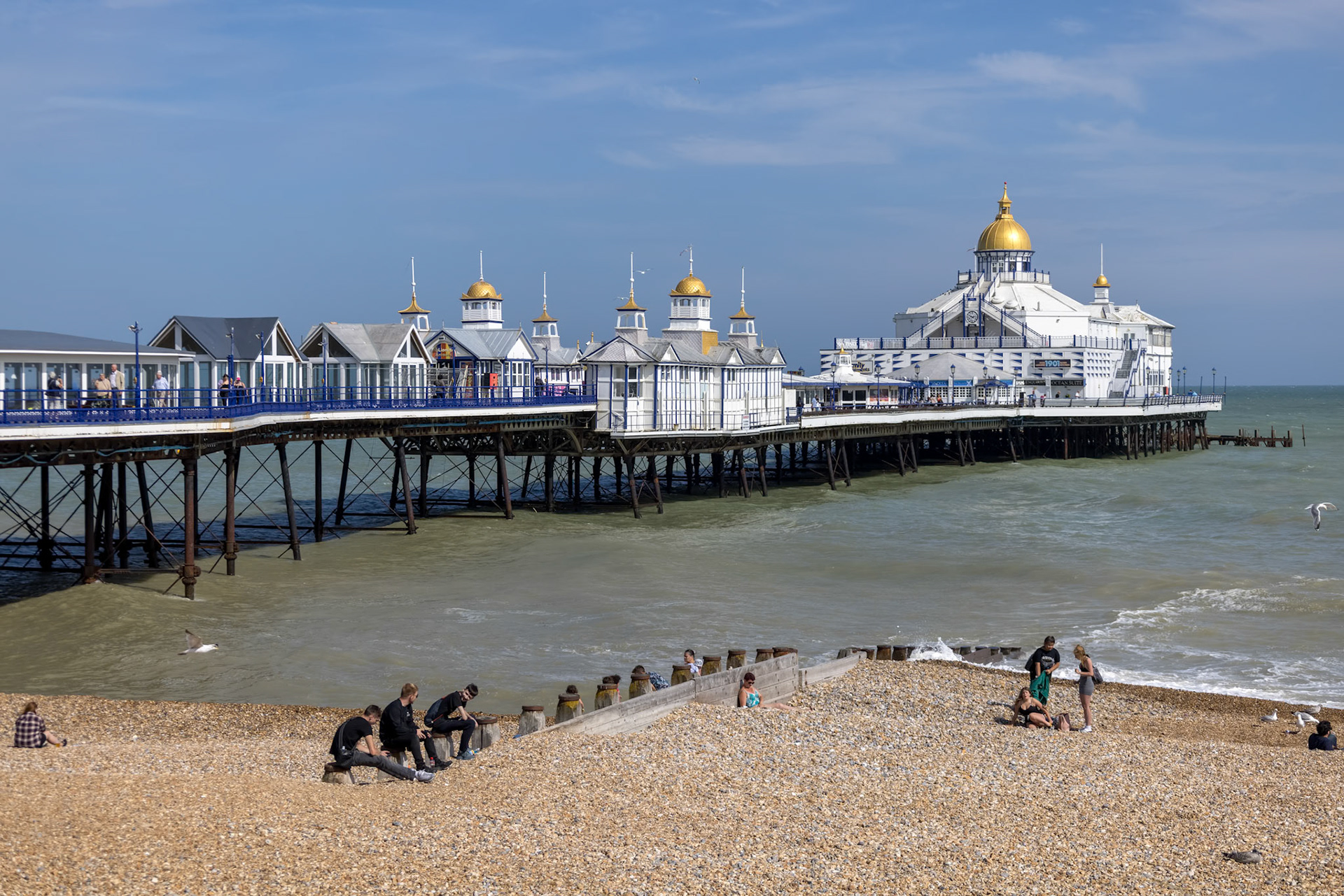 EASTBOURNE, EAST SUSSEX, UK - JULY 29 : View of Eastbourne Pier in East Sussex on July 29 2021. Unidentified people