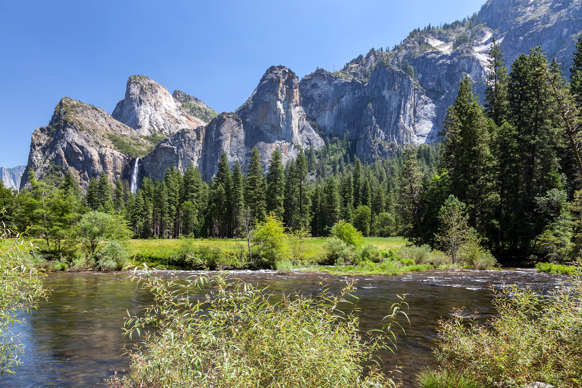 View across the Merced River to the mountains in Yosemite National Park