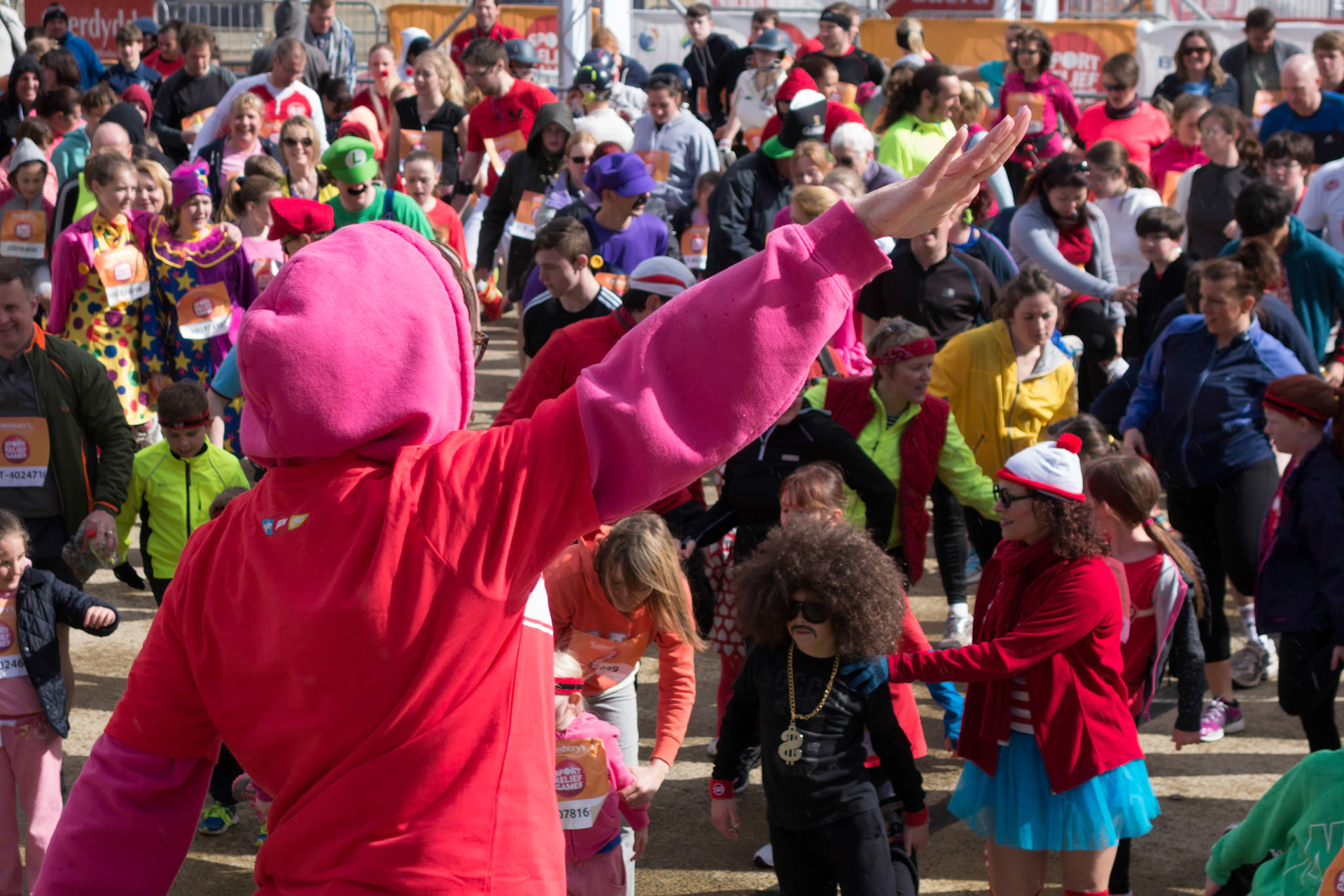 Cheerleader Warming up the Participants for the Sport Relief Race
