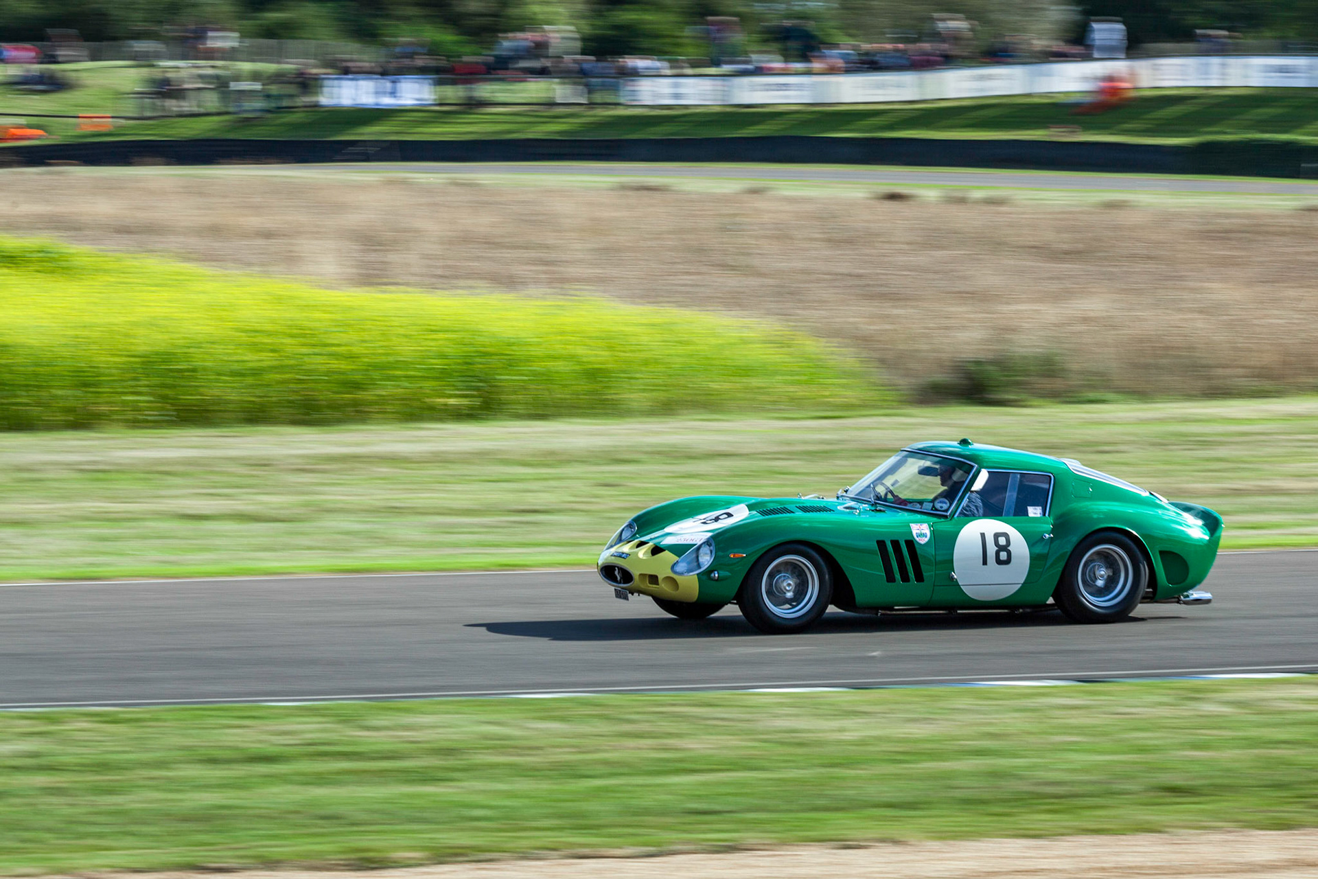 GOODWOOD, WEST SUSSEX/UK - SEPTEMBER 14 : Vintage Racing at Goodwood on September 14, 2012. One unidentified person