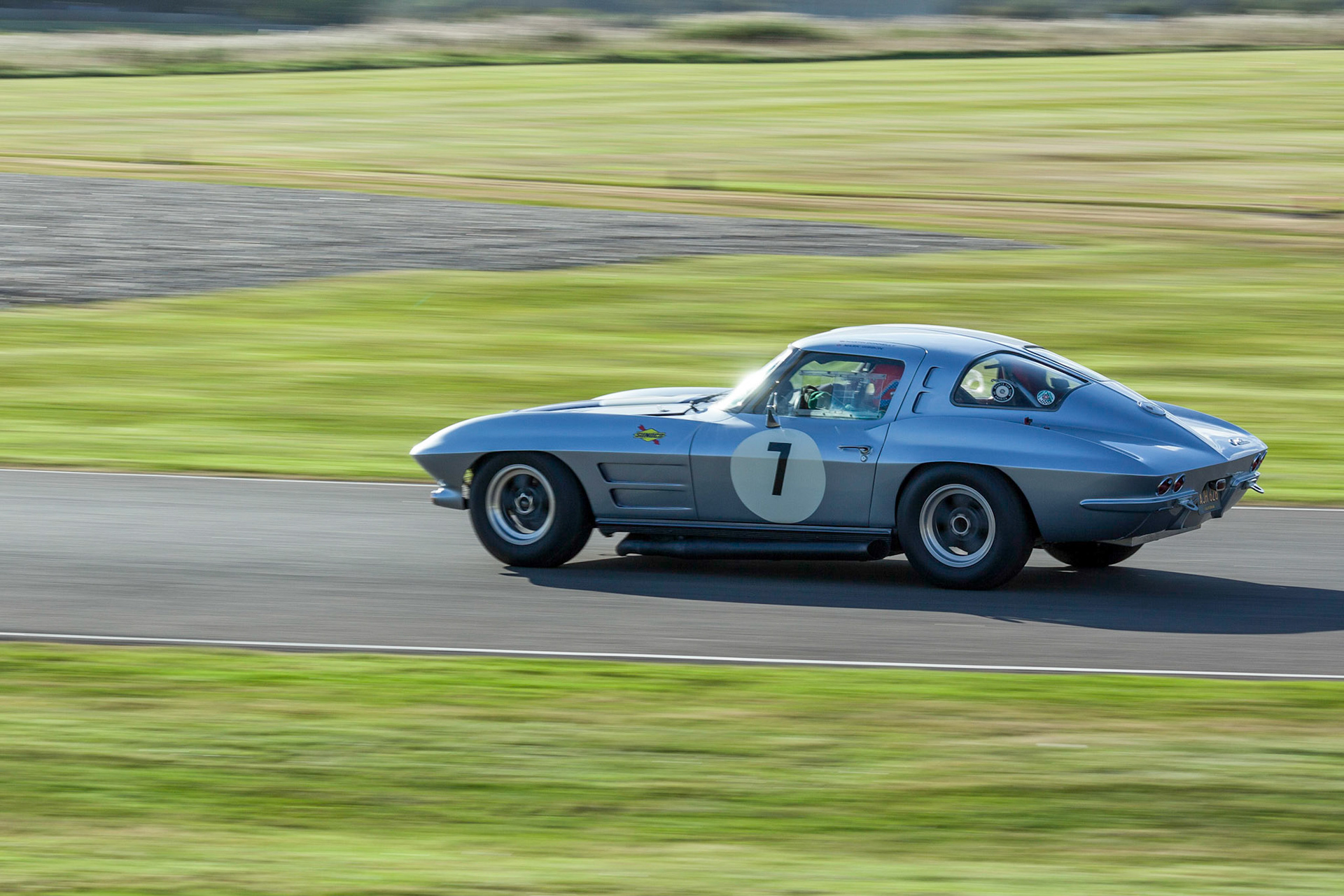 GOODWOOD, WEST SUSSEX/UK - SEPTEMBER 14 : Vintage Racing at Goodwood on September 14, 2012. One unidentified person