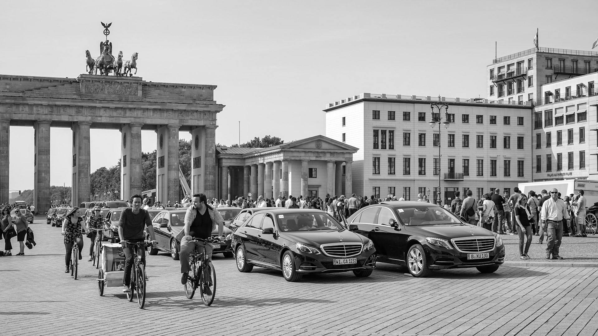 Berlin, Germany, 2014. People cycling near the Brandenburg Gate in Berlin