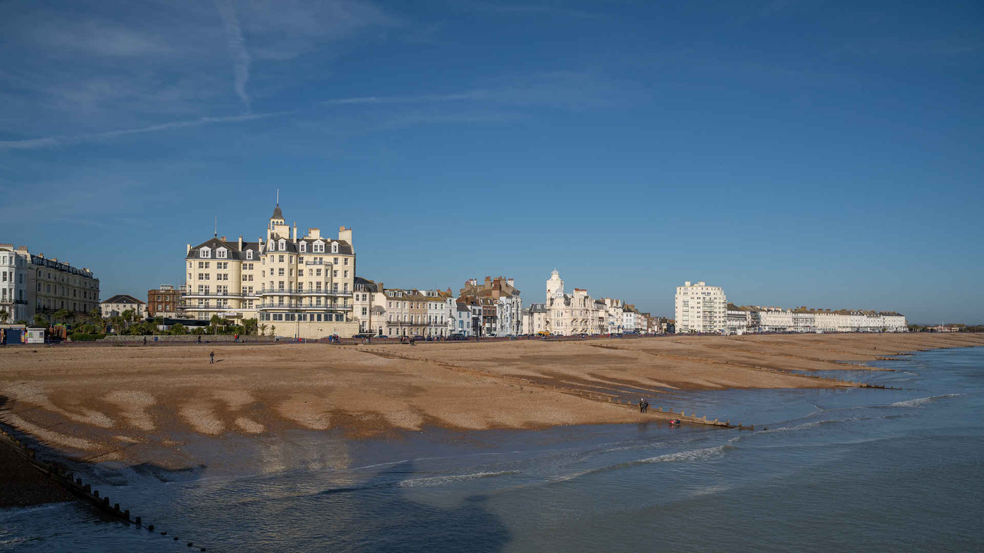 EASTBOURNE, EAST SUSSEX, UK - JANUARY 18 : View from Eastbourne Pier towards the Queens Hotel in Eastbourne East Sussex on January 18, 2020. Unidentified people