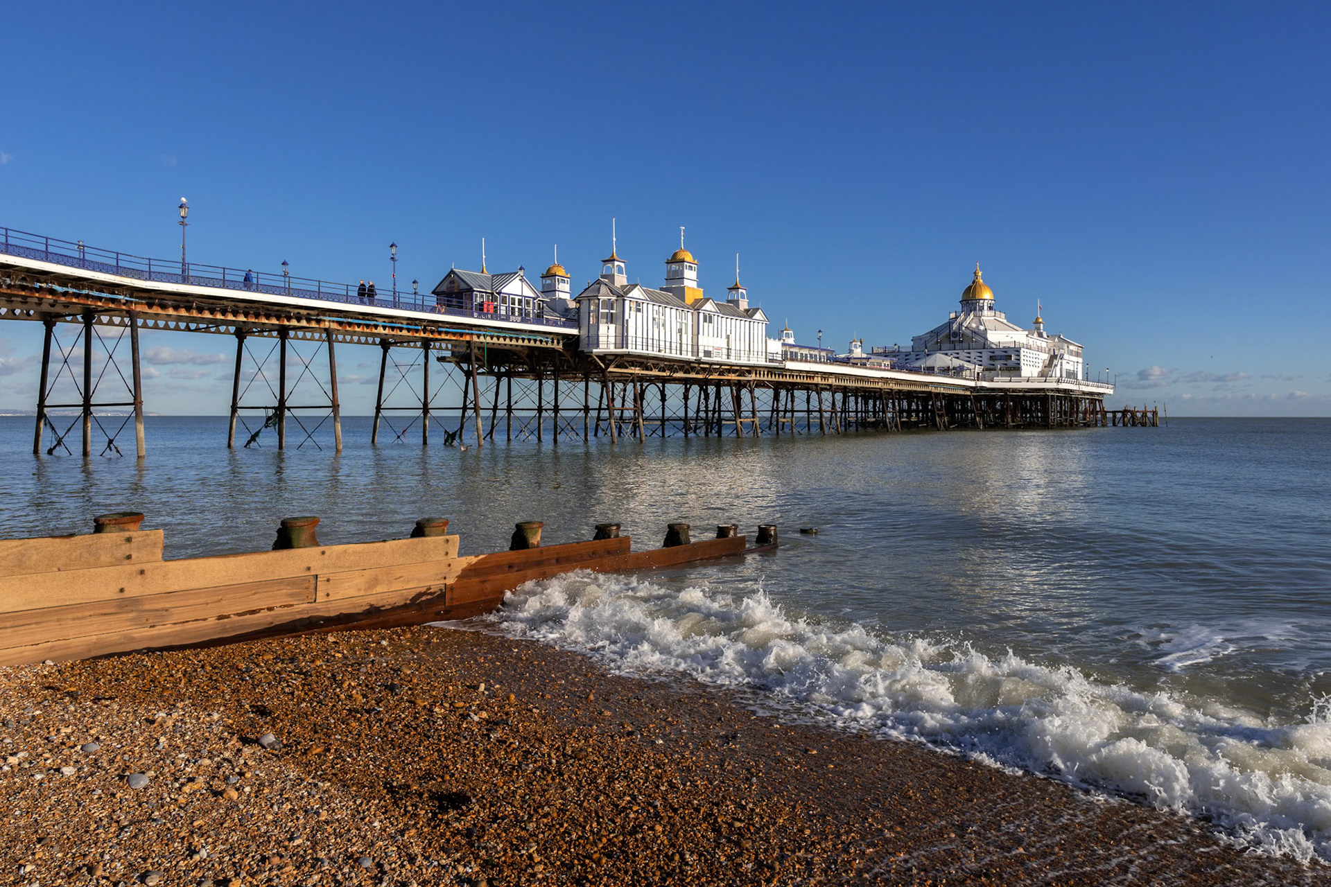 EASTBOURNE, EAST SUSSEX/UK - JANUARY 28 : View of Eastbourne Pier in East Sussex on January 28, 2019. Three unidentified people.
