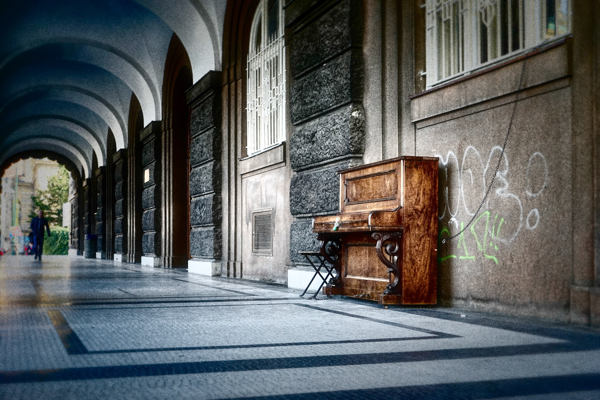 Abandoned Piano under Archways in Prague