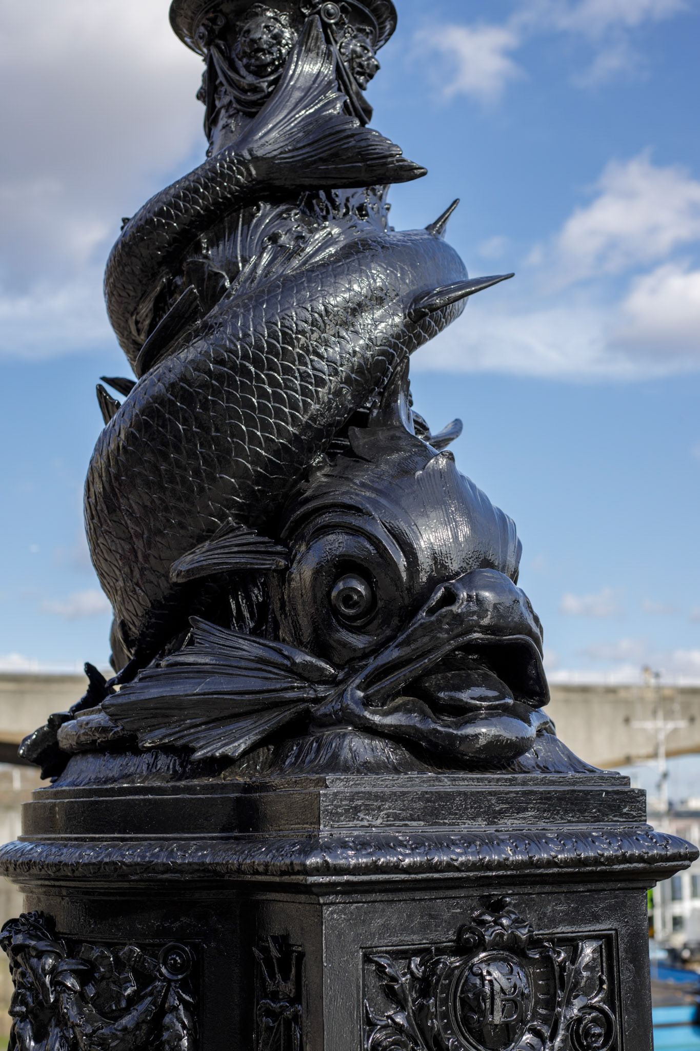 LONDON, UK - MARCH 11 : Close-up of a Vulliamy's dolphin lamp post on the Embankment in London on March 11, 2019