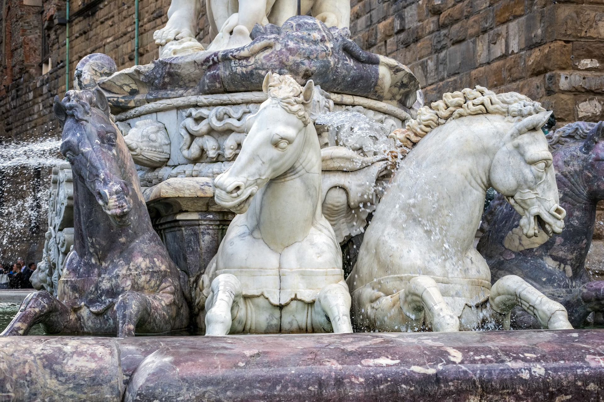 FLORENCE, TUSCANY/ITALY - OCTOBER 19 : Detail from the Fountain of Neptune statue Piazza della Signoria in front of the Palazzo Vecchio Florence on October 19, 2019