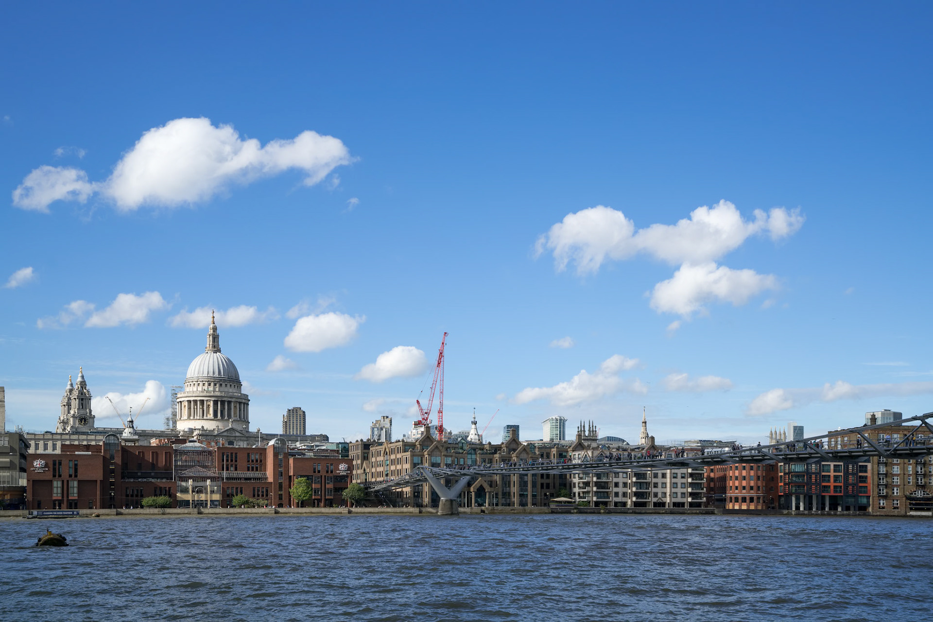 LONDON - JULY 27 : Buildings on the North Bank of the River Thames in London on July 27, 2017