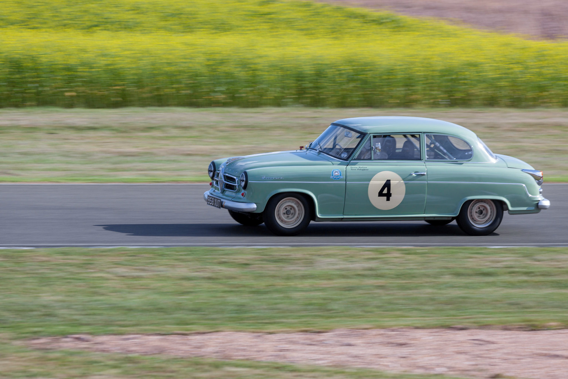 GOODWOOD, WEST SUSSEX/UK - SEPTEMBER 14 : Vintage Racing at Goodwood on September 14, 2012. One unidentified person