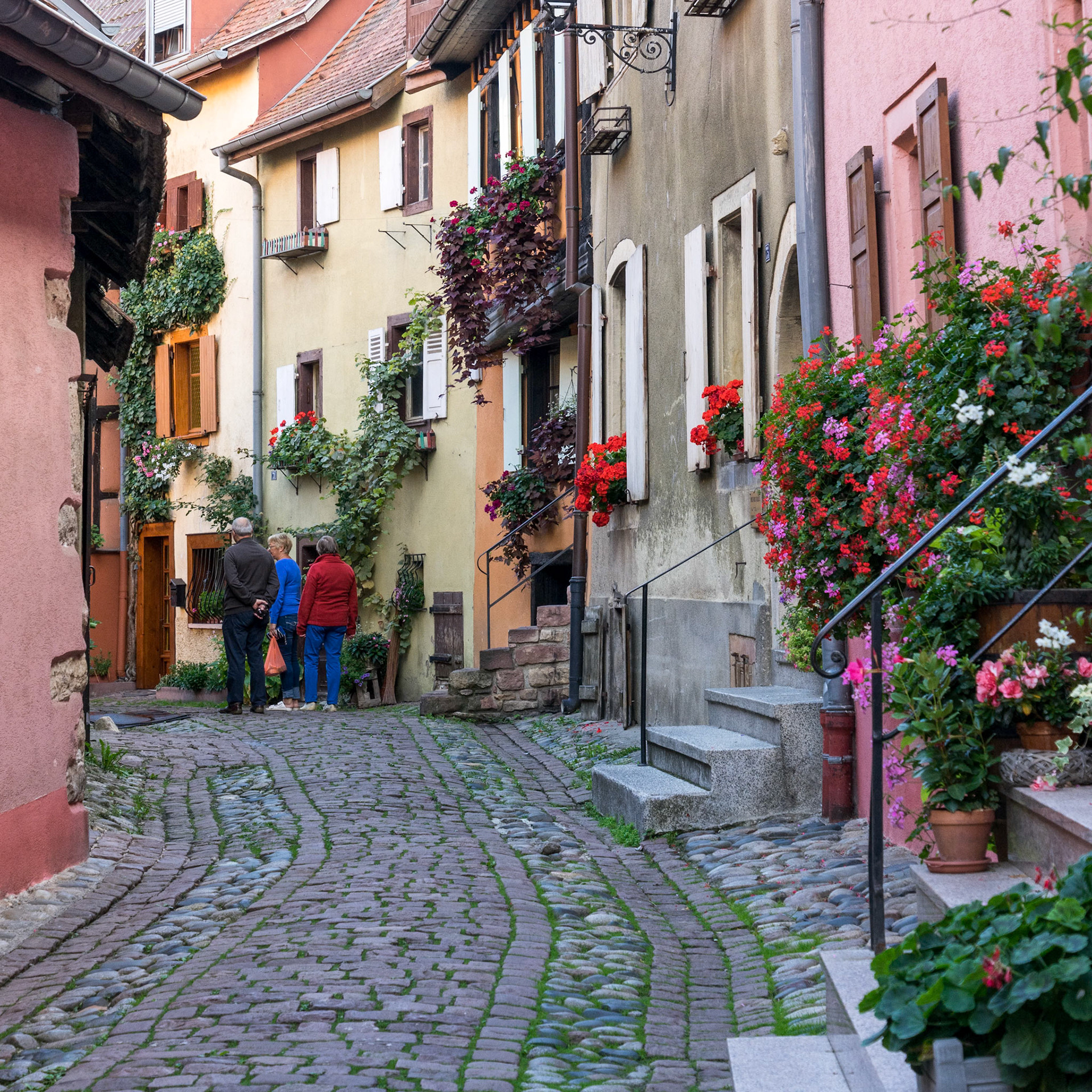 Tourists Exploring Eguisheim in Haut-Rhin Alsace