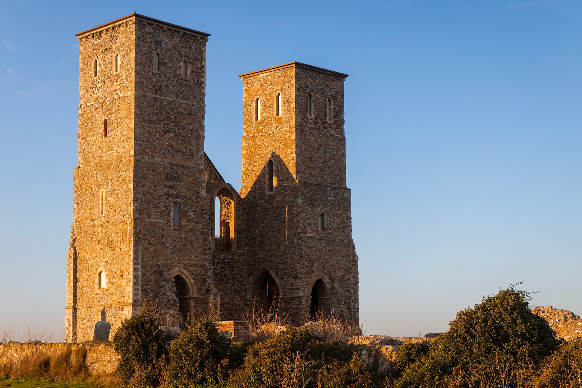 RECULVER, ENGLAND/UK - DECEMBER 10 : Remains of Reculver Church Towers Bathed in Late Afternoon Sun in Winter at Reculver in Kent on December 10, 2008