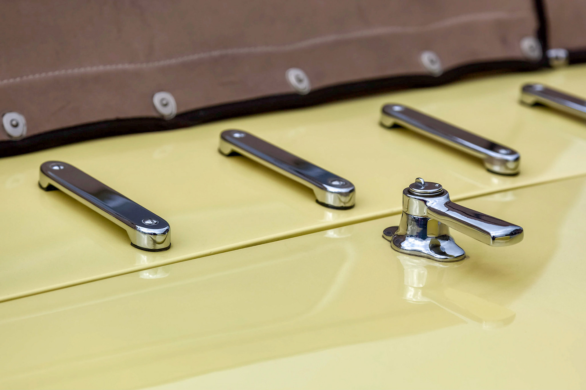 Close-up Boot Handle on Vintage Yellow Rolls Royce