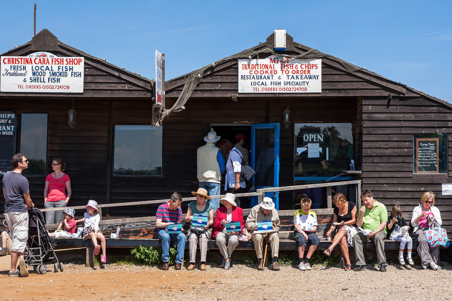 People Enjoying Fish and Chips in Southwold
