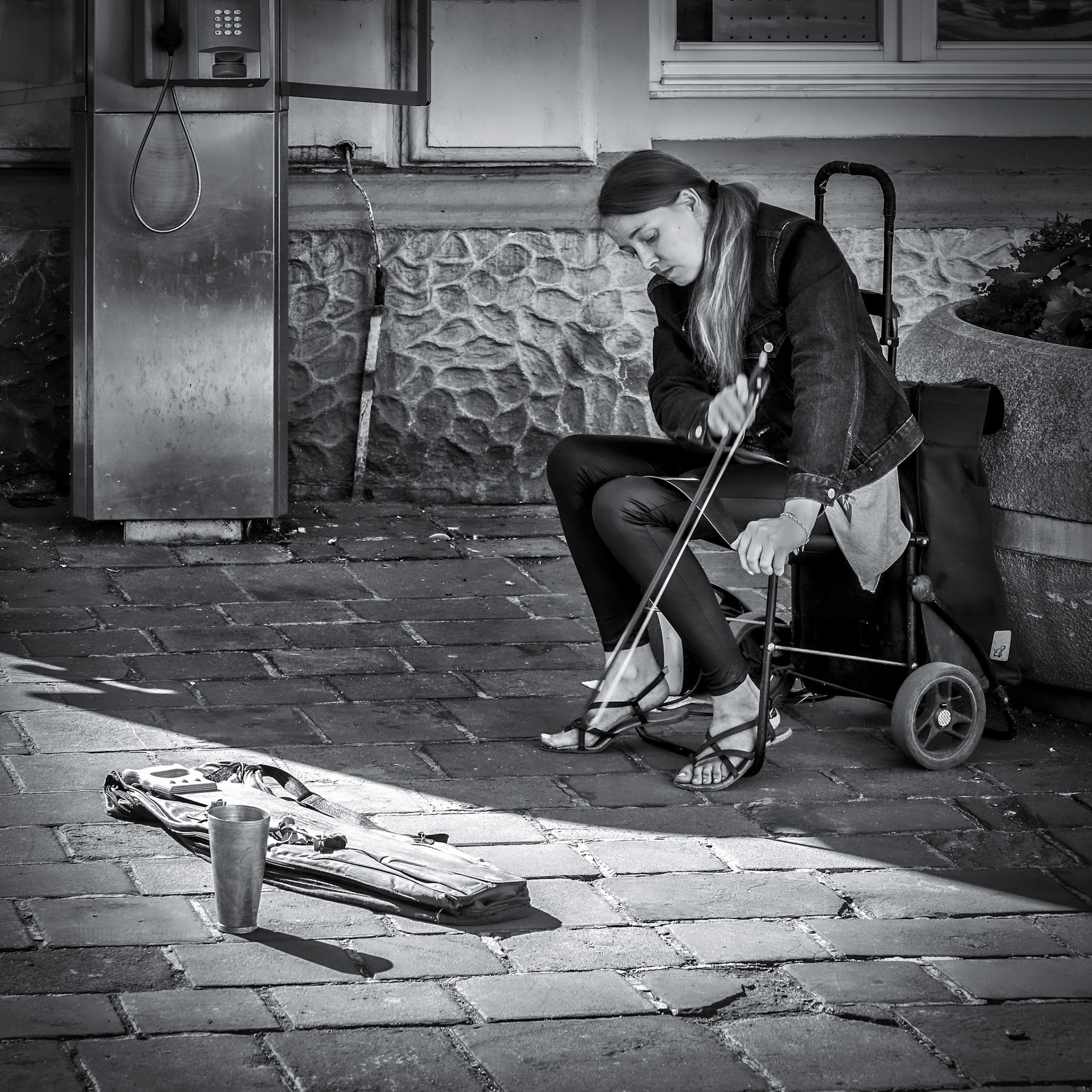 Lady Playing a Saw in Krakow