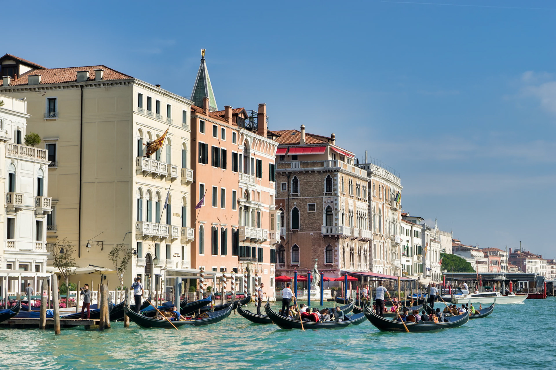 Gondoliers Ferrying People around in Venice