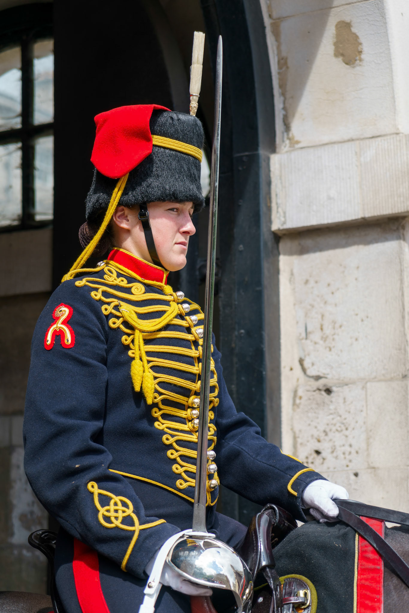 LONDON - JULY 30 : Kings Troop Royal Horse Artillery in Whitehall London on July 30, 2017. Unidentified woman
