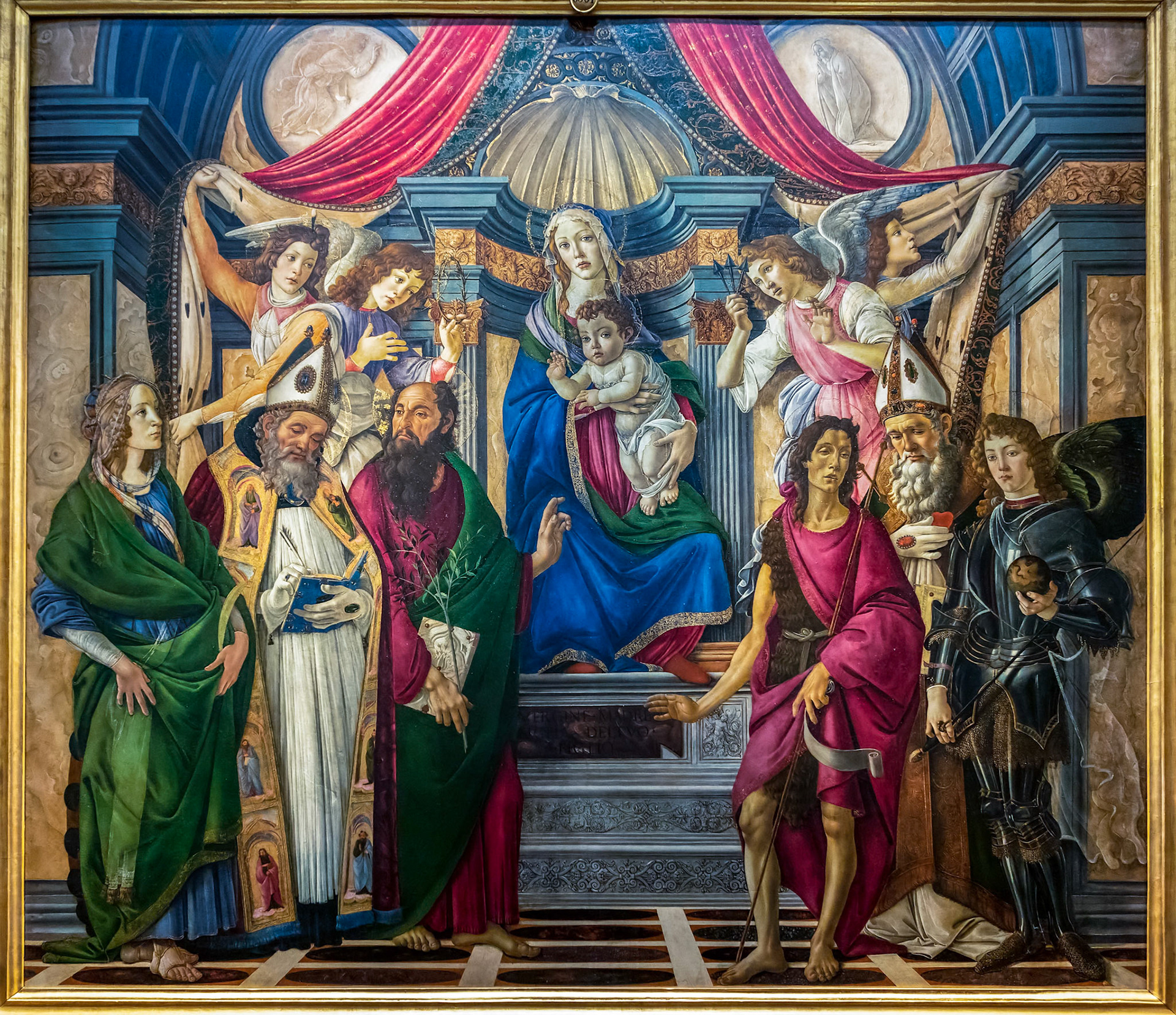 FLORENCE, TUSCANY/ITALY - OCTOBER 19 : Madonna and child enthroned with st Catherine of Alexandria painting in the Uffizi gallery in Florence on October 19, 2019