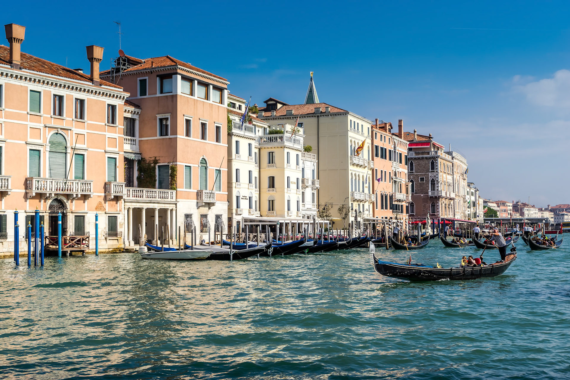 Gondoliers Ferrying People in Venice