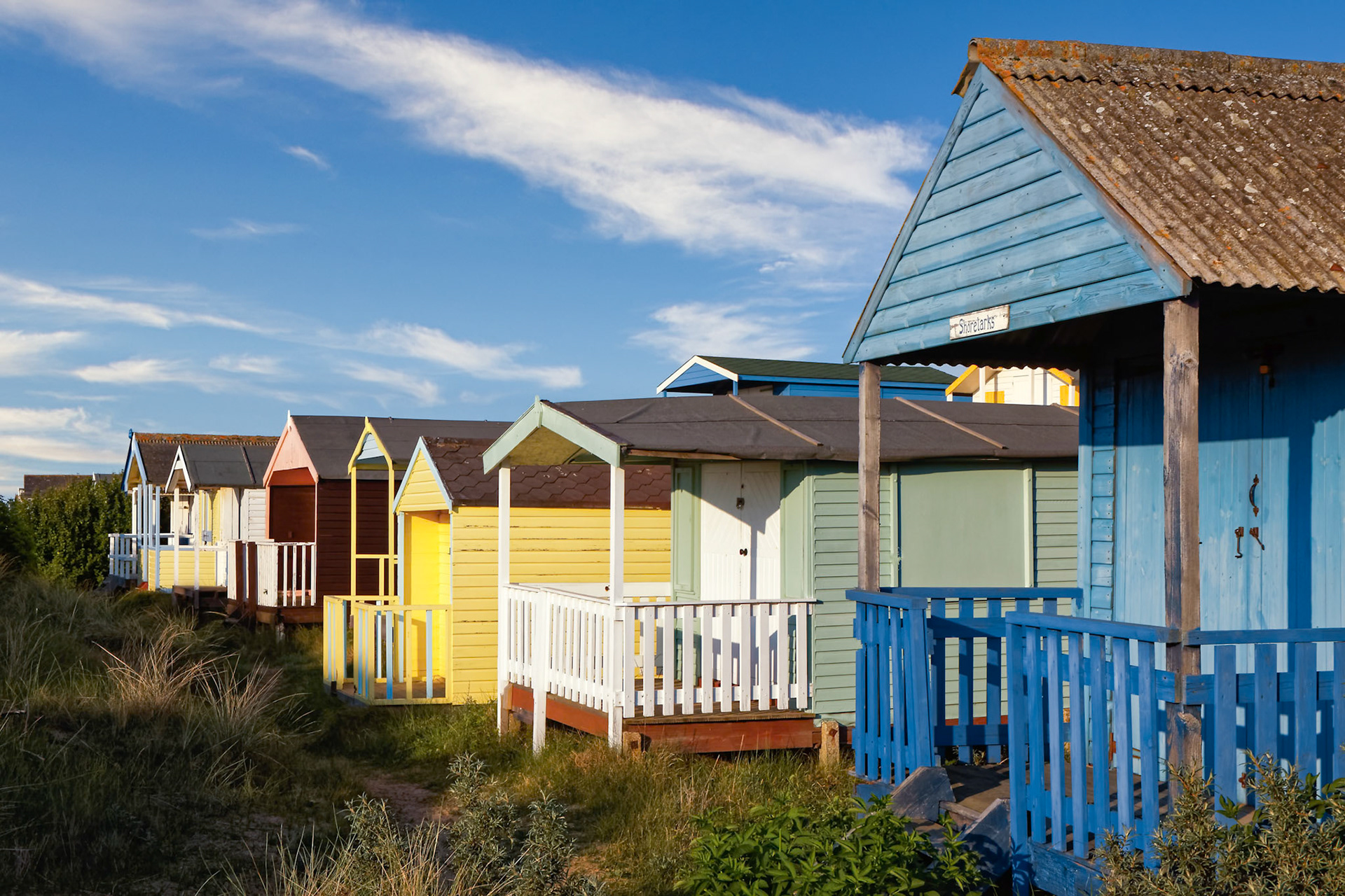 Beach Huts Bathed in Warm Evening Sunlight