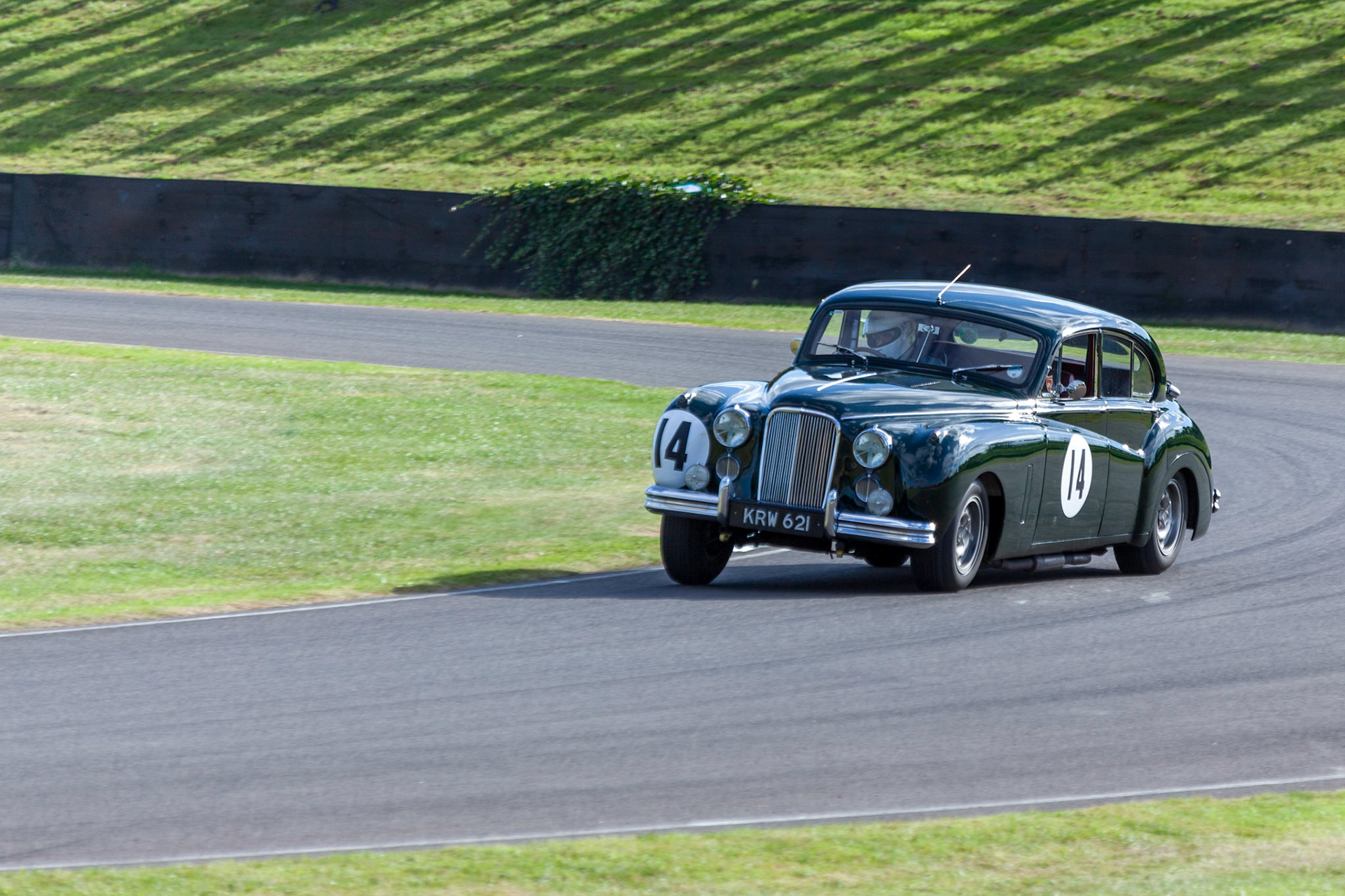 GOODWOOD, WEST SUSSEX/UK - SEPTEMBER 14 : Vintage Racing at Goodwood on September 14, 2012. One unidentified person