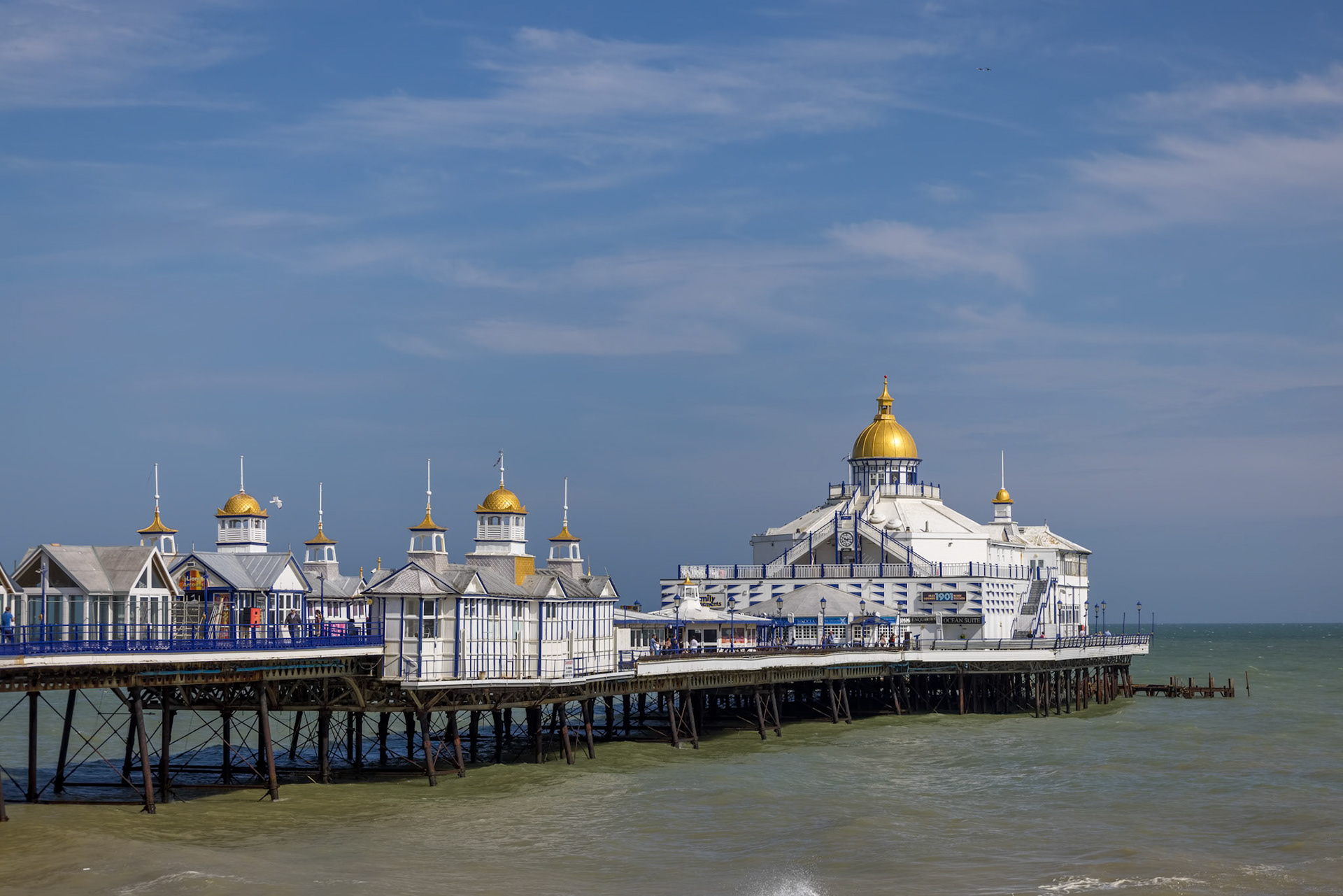 EASTBOURNE, EAST SUSSEX, UK - JULY 29 : View of Eastbourne Pier in East Sussex on July 29 2021. Unidentified people