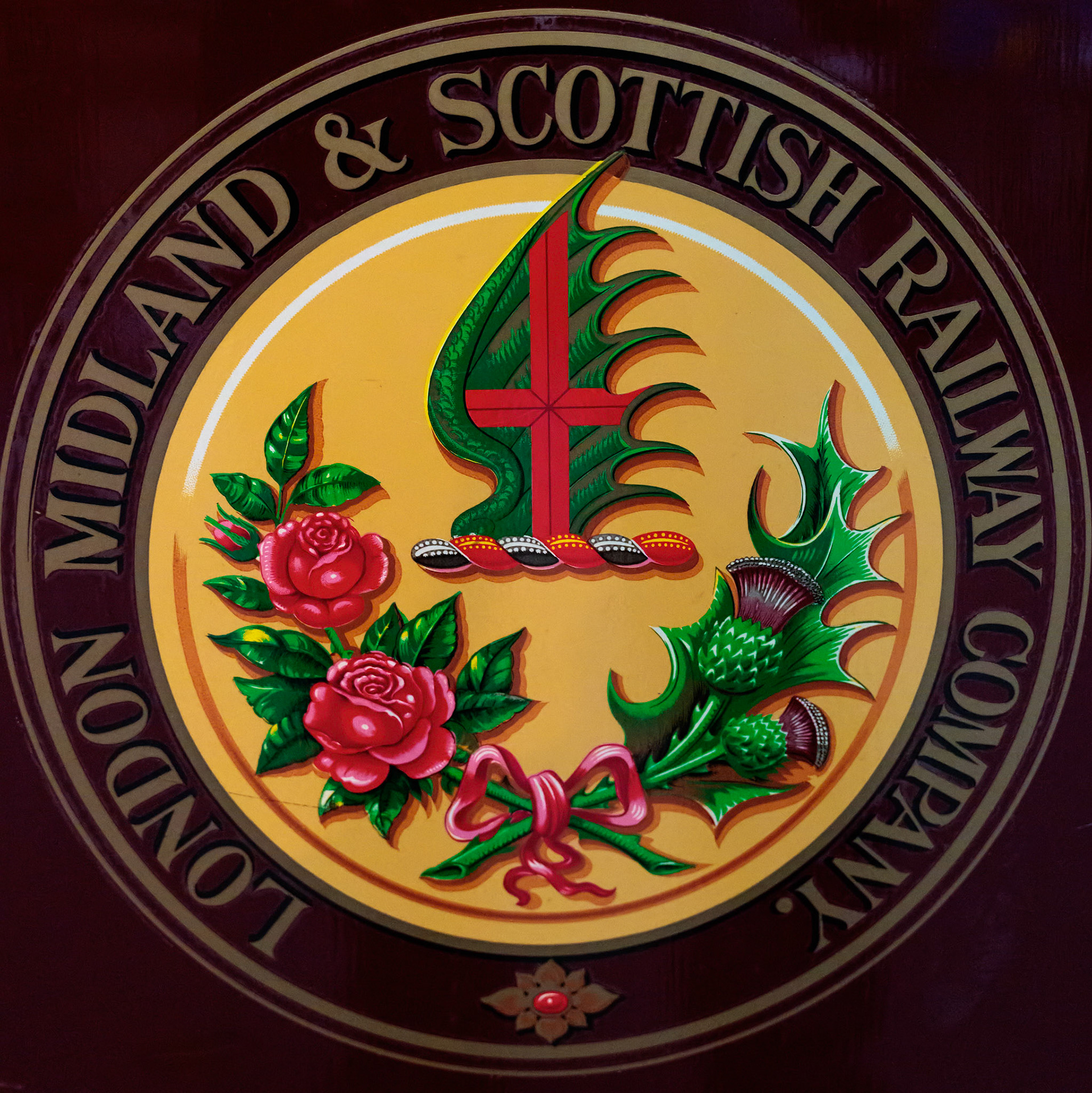 Old logo for the London Midland and Scottish Railway Company