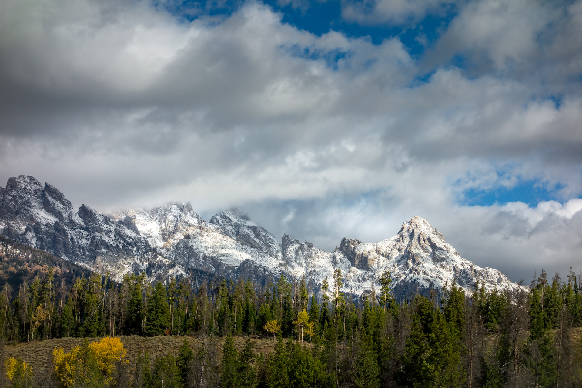 Scenic view of the Grand Teton mountain range in autumn