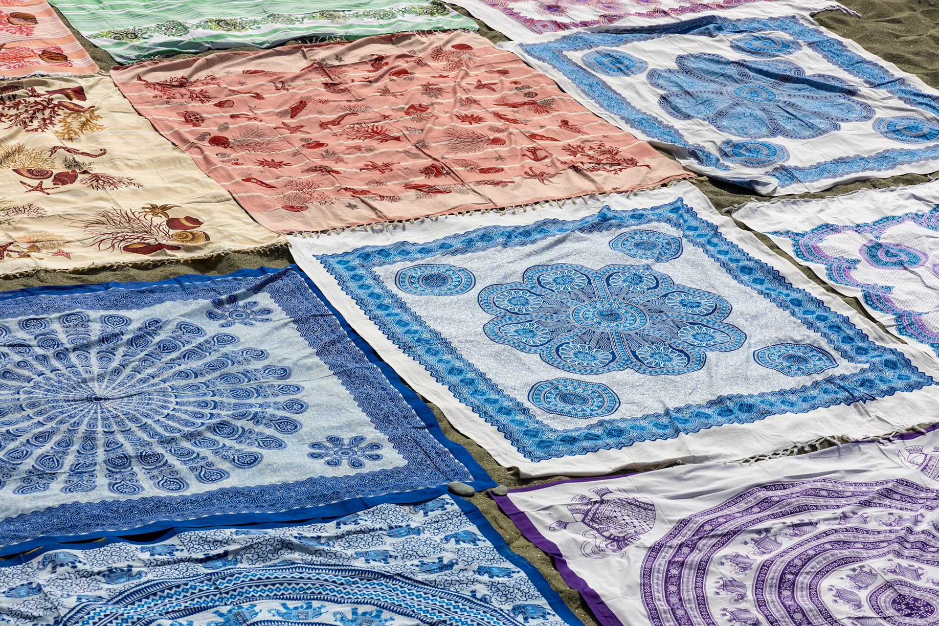 MONTEROSSO, LIGURIA/ITALY  - APRIL 22 : Beach blankets for sale at Monterosso Liguria Italy on April 22, 2019