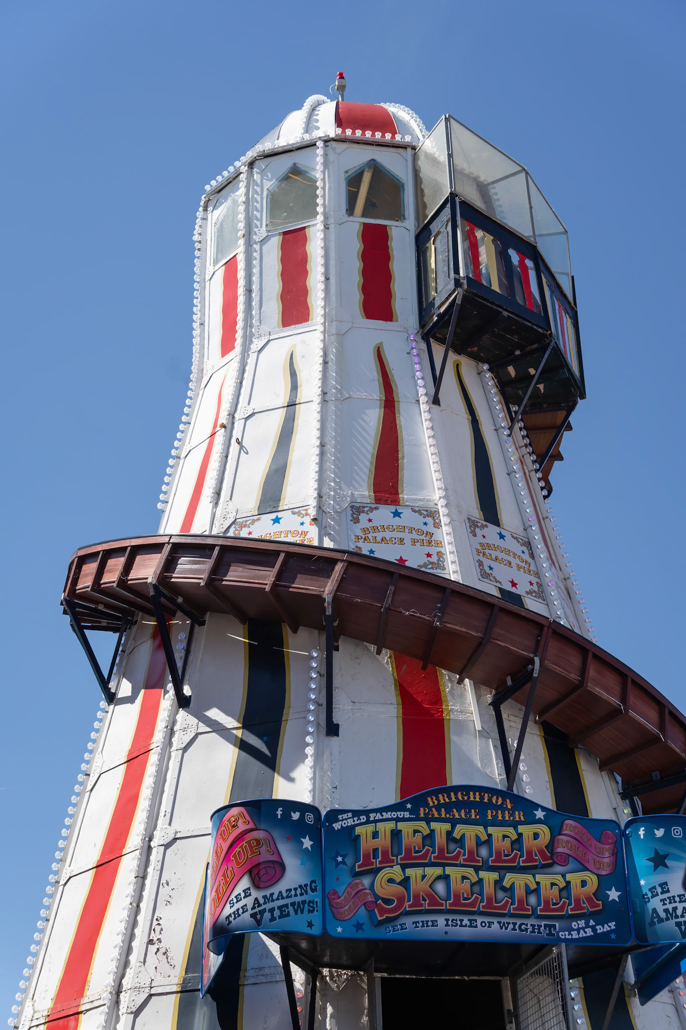 Brighton, East Sussex, UK - July 15, 2022 : View of the helter skelter on the pier in Brighton on July 15, 2022