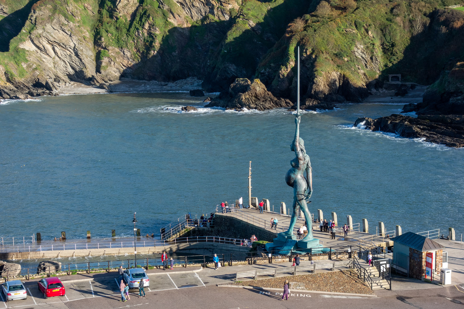 ILFRACOMBE, DEVON/UK - OCTOBER 19 : View of Damien Hirst's Verity at Ilfracombe harbour in Devon on October 19, 2013. Unidentified people