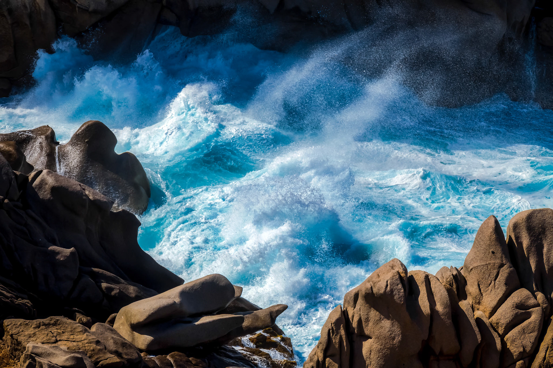 Waves Pounding the Coastline at Capo Testa