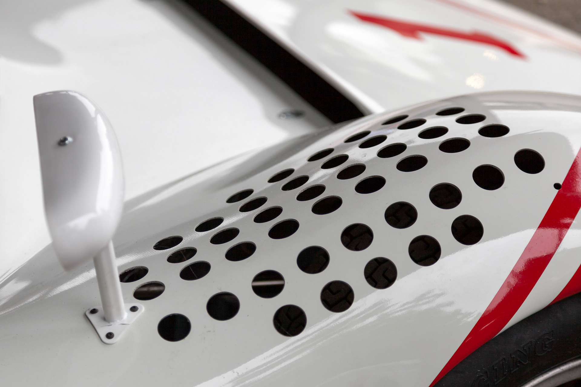 Close-up of Front Wing and Mirror of a Vintage Racing Car