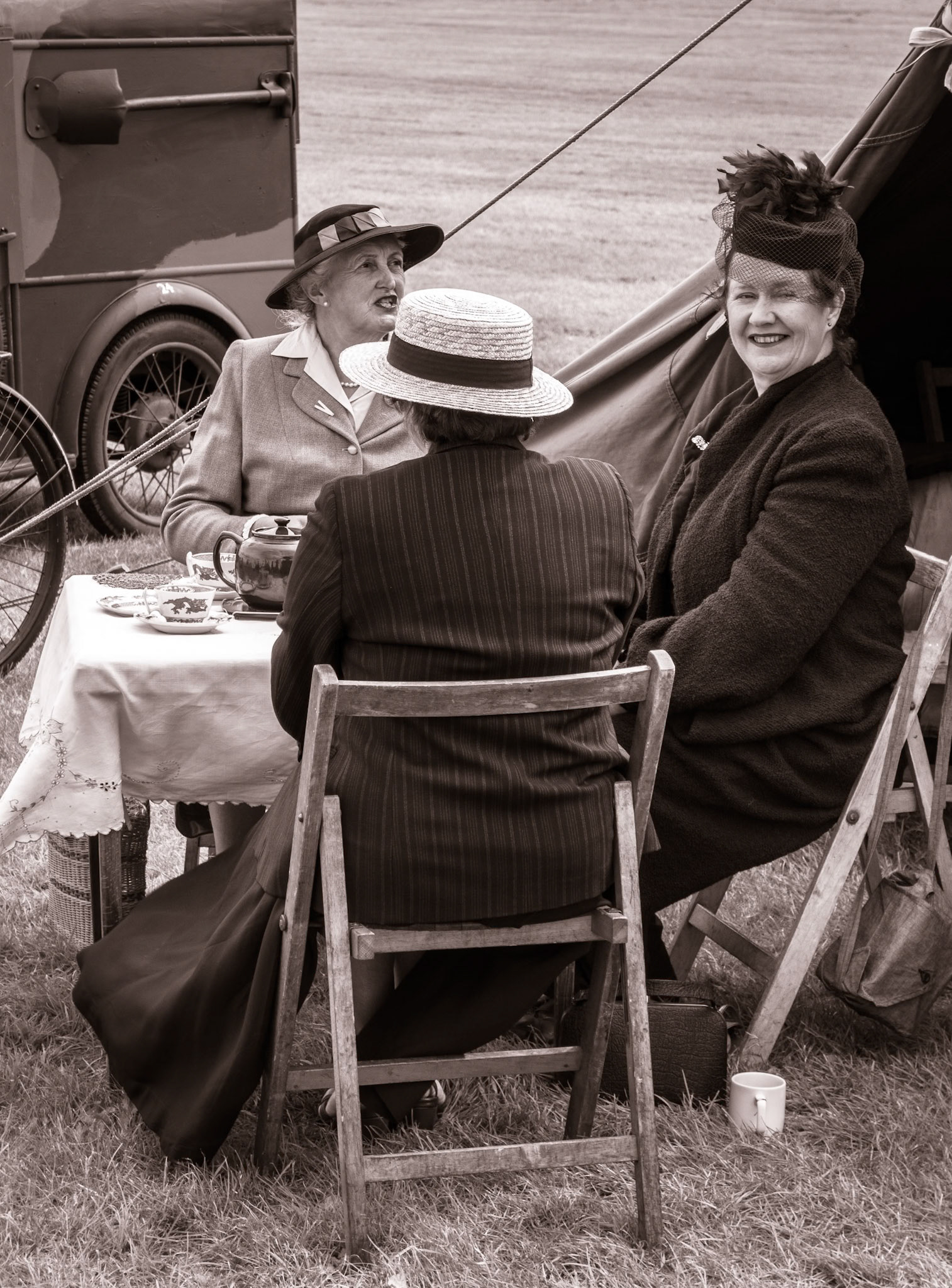 SHOREHAM-BY-SEA, WEST SUSSEX/UK - AUGUST 30 : Afternoon tea at  the Shoreham Airshow in Shoreham-by-Sea, West Sussex on August 30, 2014. Three unidentified women