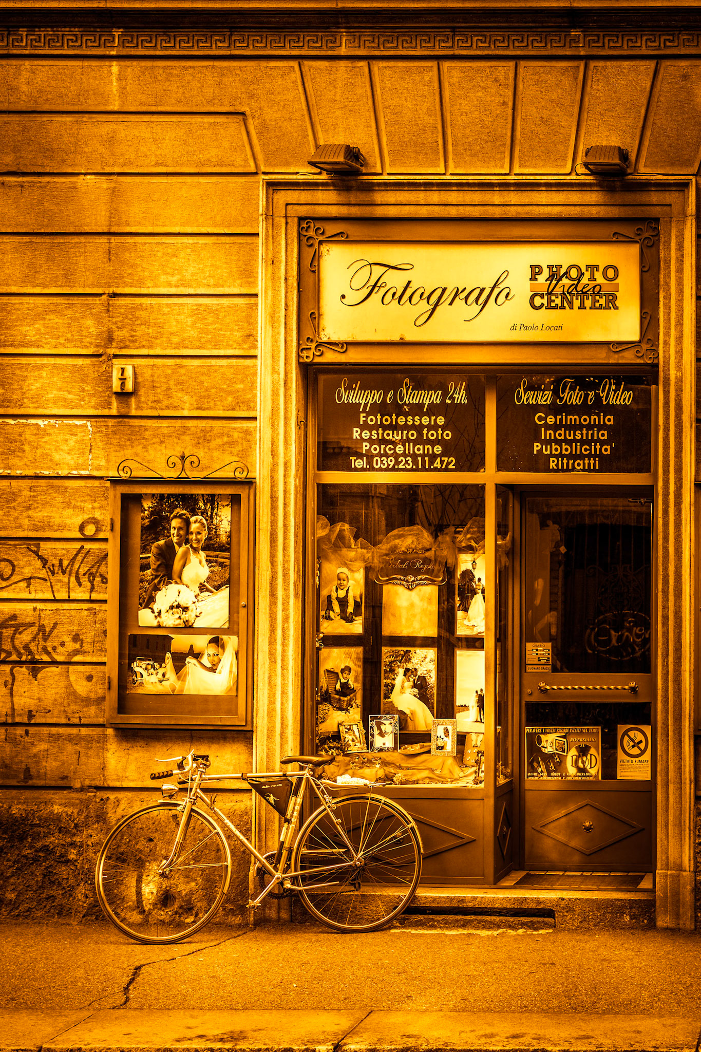 MONZA, ITALY/EUROPE - OCTOBER 28 : Bicycle outside a photography shop in Monza Italy on October 28, 2010