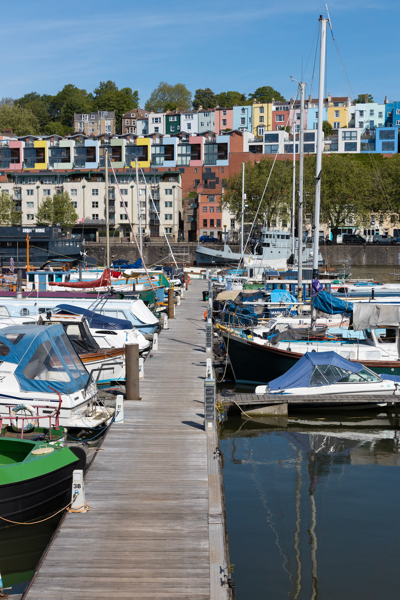 BRISTOL, UK - MAY 14 : View of boats and colourful apartments along the River Avon in Bristol on May 14, 2019