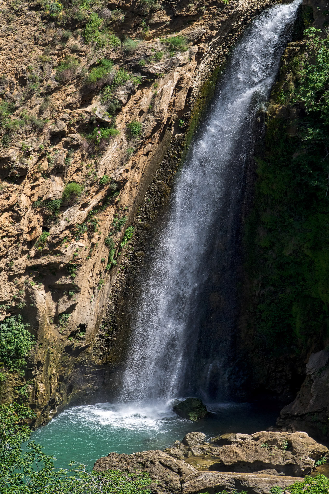 Waterfall below the New Bridge at Ronda Spain